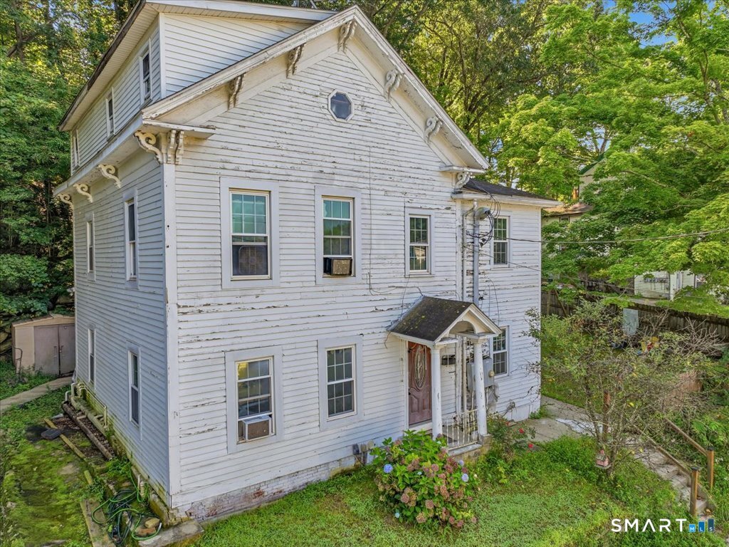 Photo 3 of Multi family home for sale at 57 Wilkinson St, Putnam, CT 06260 | MLS# 24193499 | Listing updated on 2026-08-31