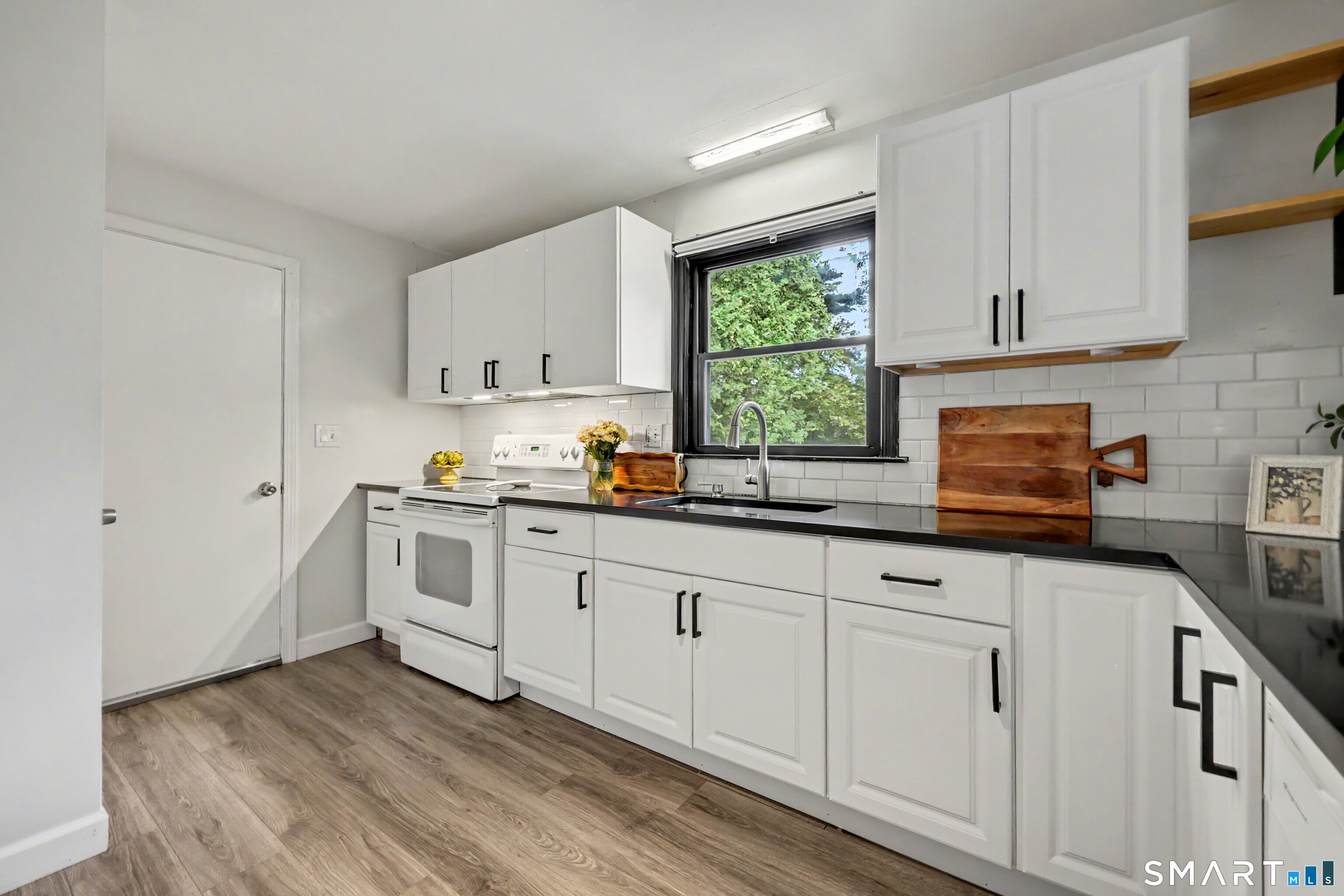 Photo 4 of Single family home for sale at 12 Hillview Ave, Hamden, CT 06514 | MLS# 24201362 | Listing updated on 2026-09-23