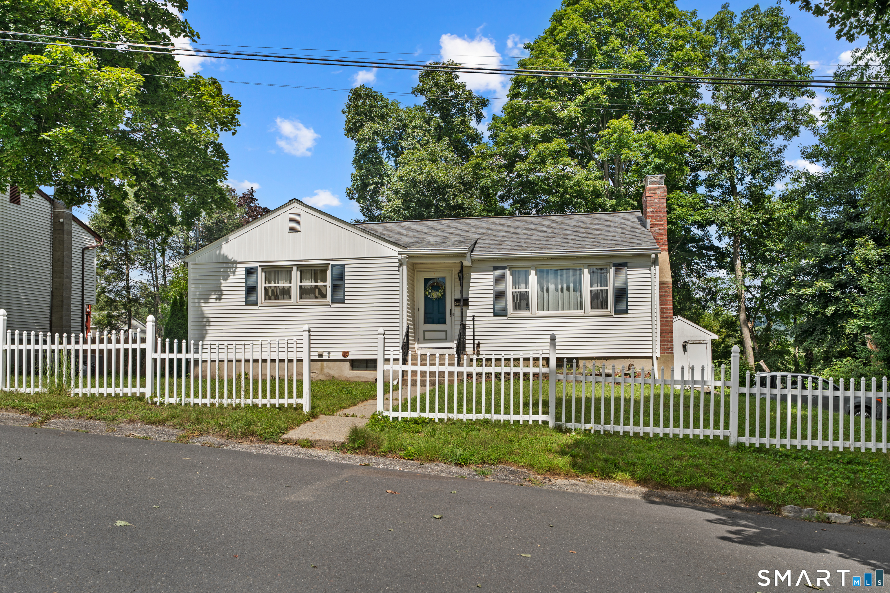Welcome home to this charming, move-in-ready 2-bedroom Ranch located in the desirable Bunker Hill neighborhood! Conveniently situated with easy access to shopping, schools, restaurants, and major highways, this home offers comfortable one-level living in a great location.  Step inside to find hardwood floors throughout, a warm and inviting living room featuring a cozy fireplace, and an eat-in kitchen complete with stainless steel appliances. Both bedrooms offer hardwood flooring and plenty of natural light.  Outside, enjoy a quarter-acre lot, low-maintenance vinyl siding, a covered deck, and the convenience of a one-car garage. With city water and city sewer, this well-maintained home is an excellent option for first-time buyers, downsizers, or anyone looking for an easy-to-maintain home in a convenient Bunker Hill location.  Move right in and make it your own!