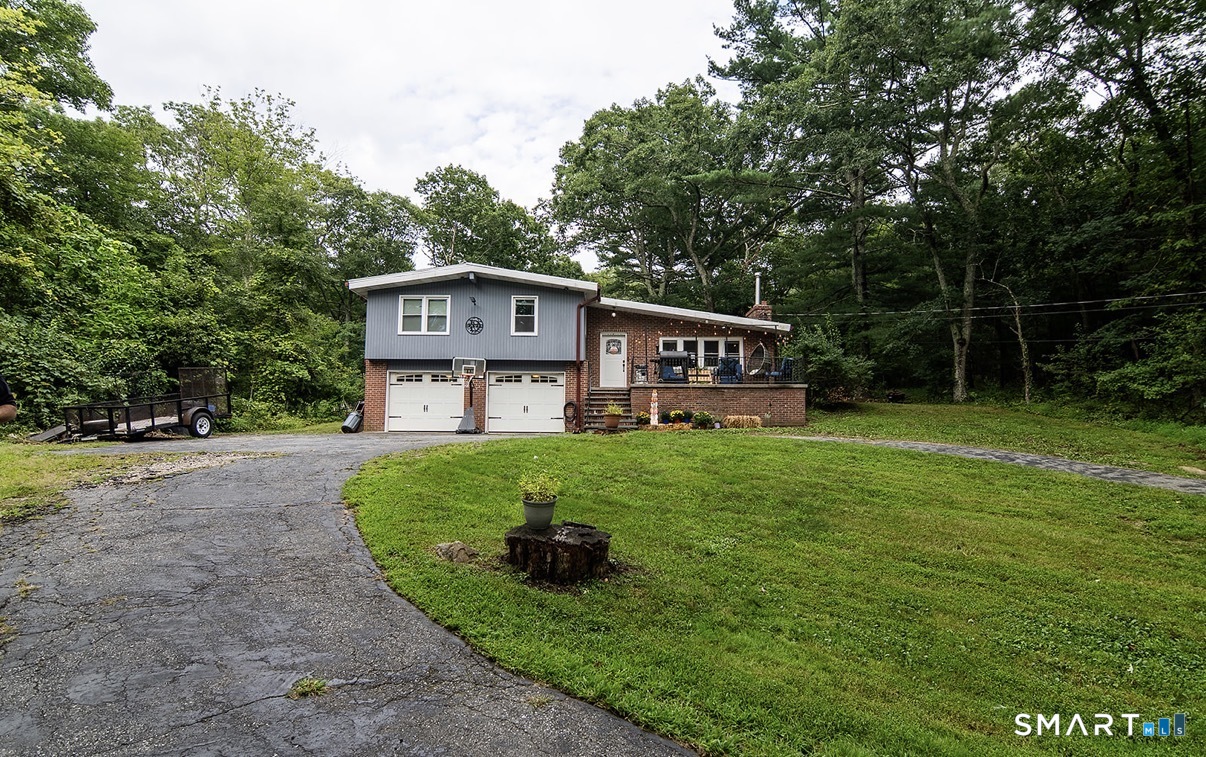 Photo 2 of Single family home for sale at 686 Squaw Rock Rd, Moosup, CT 06354 | MLS# 24200772 | Listing updated on 2026-09-14