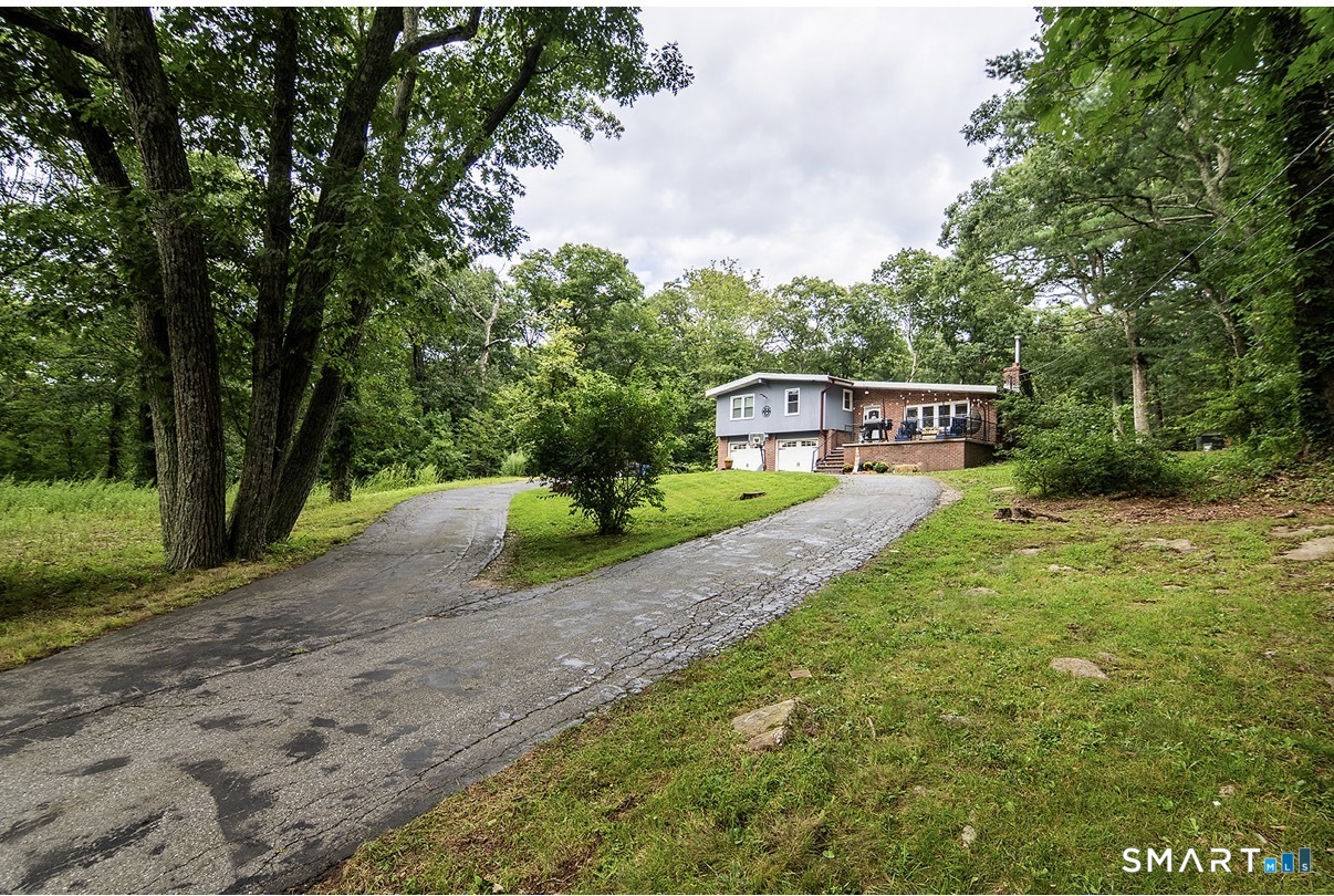 Photo 3 of Single family home for sale at 686 Squaw Rock Rd, Moosup, CT 06354 | MLS# 24200772 | Listing updated on 2026-09-14