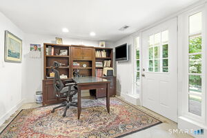 Home office with entrance from front of house.