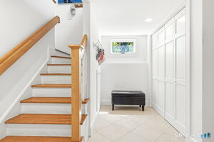 Mudroom adjacent to home office and off of garage.