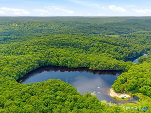 Property borders Topstone Park. 280 acres of trails, lake, with beach and more. Has canoes and kayak's for your use. Just steps away from your home.
