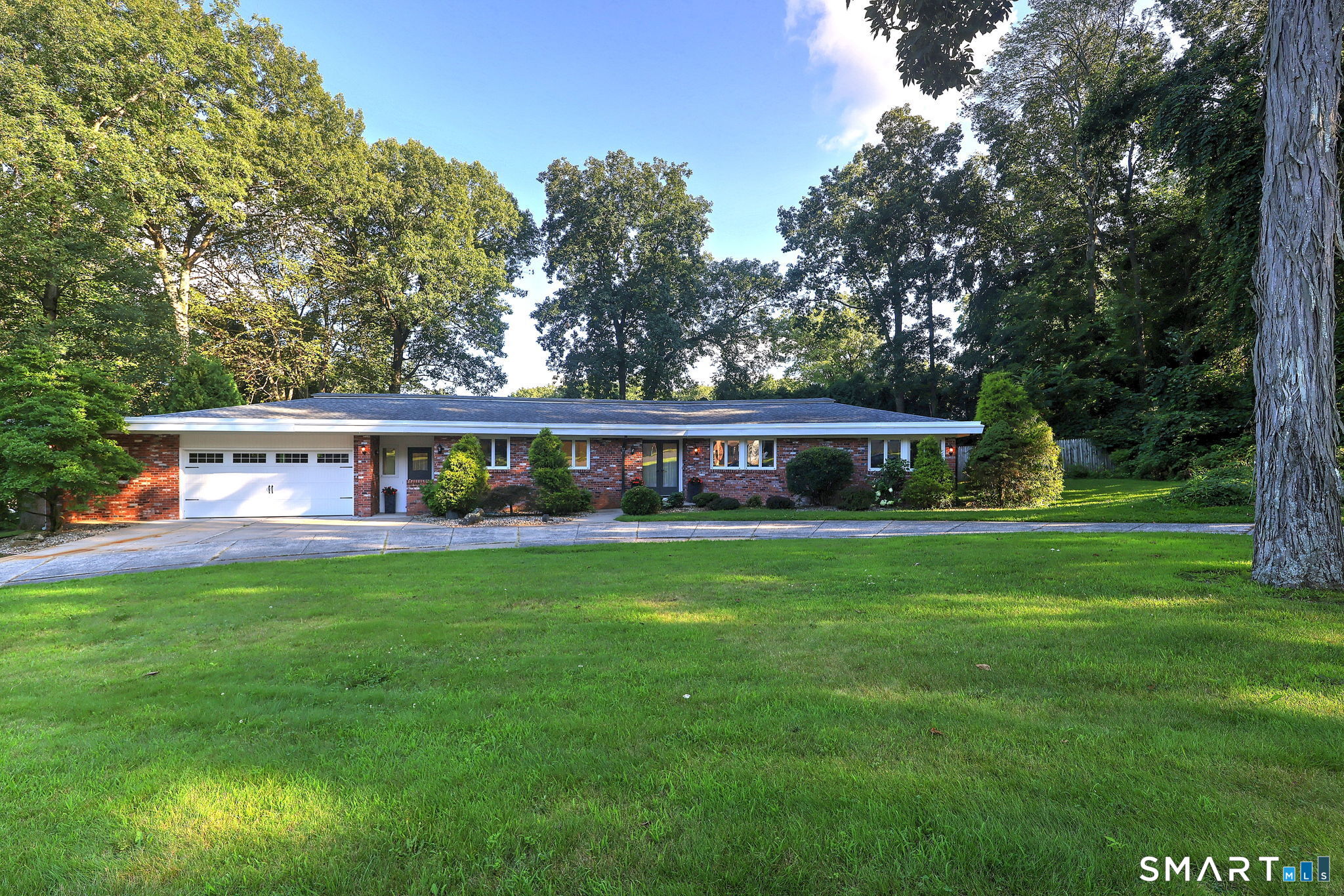 Rare Find!Chippens Hill!.Location!.Location!One of finest neighborhoods in Bristol!...Beautiful Custom Built Brick "Mid Century Modern"Sprawling Ranch on private acre with circular driveway and amazingly private fenced backyard plus full tree border,remodeled kitchen with granite counter tops and stainless steel appliances, glass stovetop with brick arched surround,separate indoor grill fueled by propane in brick lined built in,island penninsula breakfast bar,built in bar with sink,Dining Room overlooks glassed sunporch leading to expansive deck and beautiful backyard!Open floor plan with windows and sliders to enjoy open view of backyard !Sunken Livingroom with stunning arched fireplace and hearth!3 bedrooms(one can be a family room or office and closed off from Livingroom,Primary Bedroom has huge full bathroom with sunken tiled shower and side dressing area with plenty of storage and closets!Huge cedar Closet in garage at left of house(the real deal true cedar lined!) newer Briggs and Stratton "Fortress"Generator and propane tanks on left side backyard,many unique custom features..