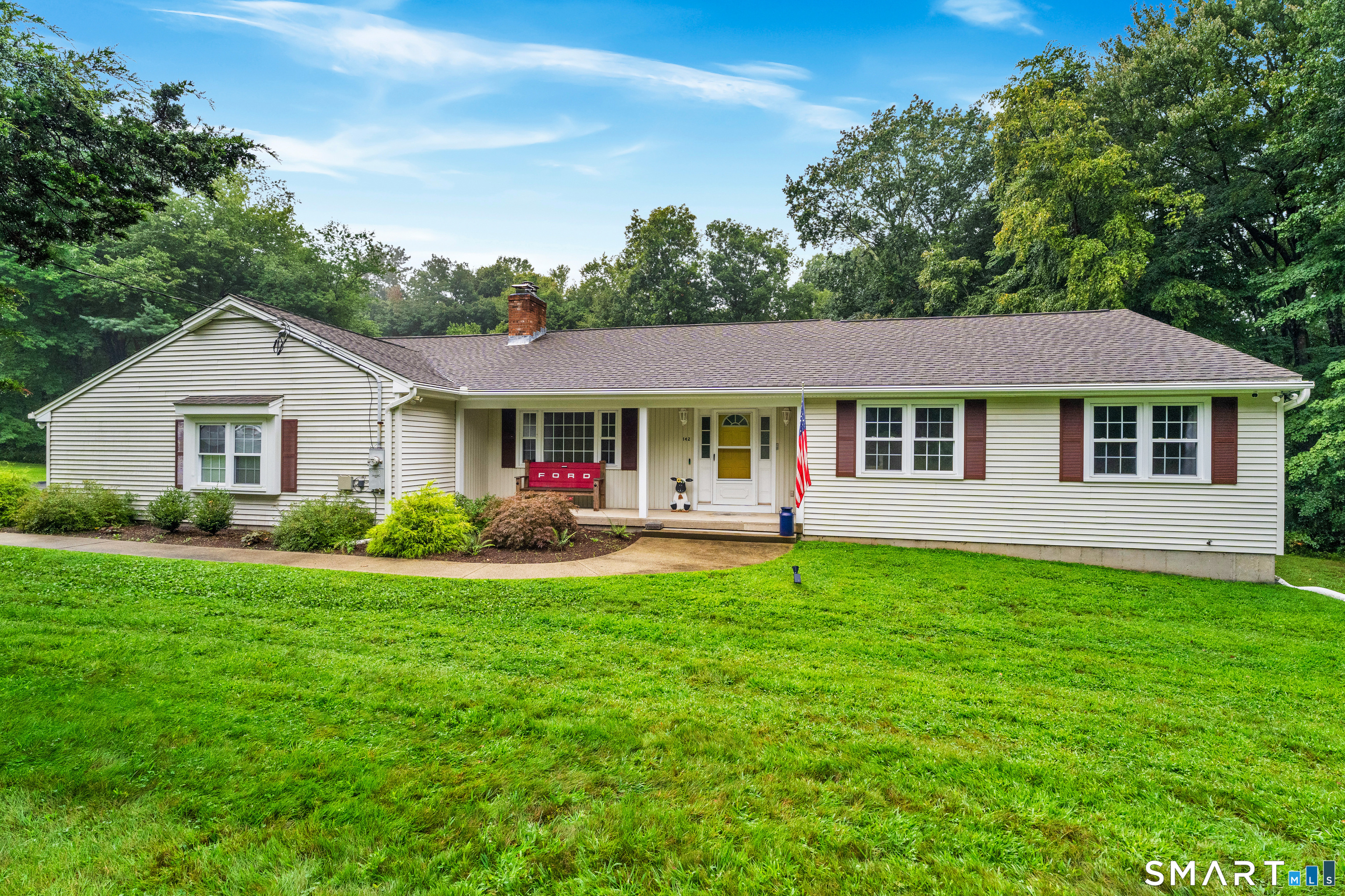 Charming and inviting, this beautifully maintained ranch is set on 1.5+ acres in desirable Woodbridge. The home offers a wonderful blend of classic charm and thoughtful updates, with hardwood floors and an inviting, comfortable feel throughout. The updated kitchen is a standout, featuring gorgeous cabinetry, quartz countertops and a beautiful backsplash. The living room offers a cozy fireplace with wood stove insert, creating a warm and welcoming space to gather and relax. Three bedrooms and two full baths provide a comfortable and versatile layout, while the charming front porch adds an extra touch of character. An attached two-car garage provides plenty of convenience, and the spacious property offers room to enjoy the outdoors in a peaceful setting. Ideally located in sought-after Woodbridge, this is a special home with charm, comfort and plenty to offer.