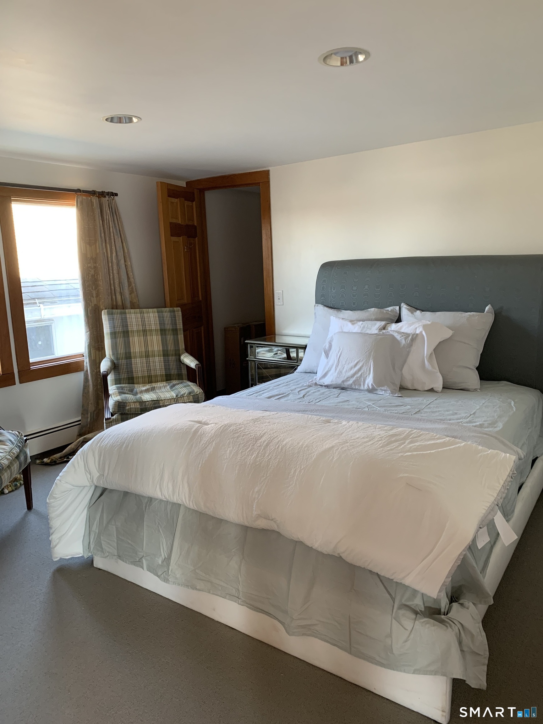 Primary bedroom with attached bath.