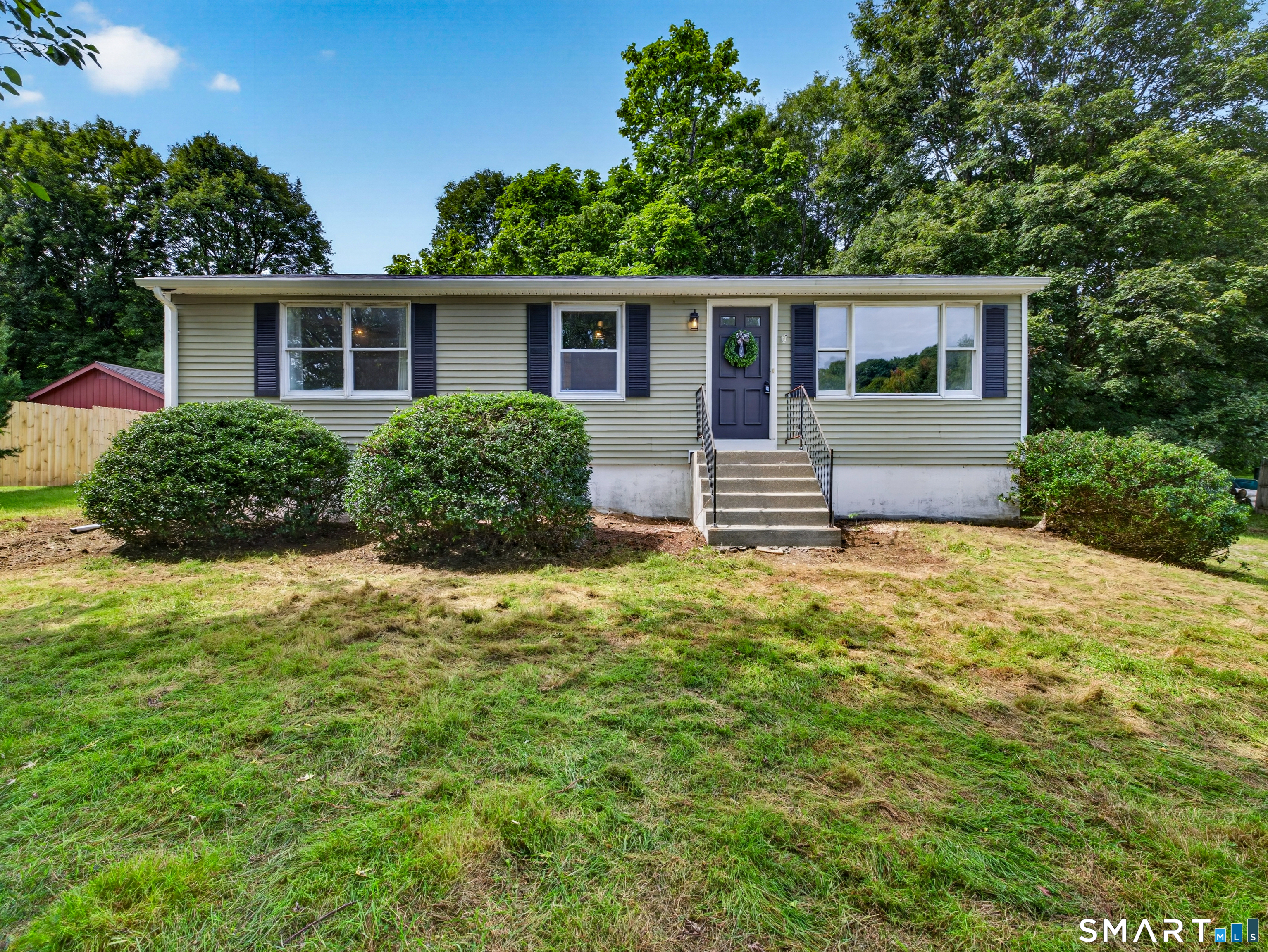 Welcome to this charming 3-bedroom, 1-bathroom ranch-style home in Plainfield, offering comfortable one-level living with a peaceful, set-back-from-the-road setting. This move-in-ready home features a brand-new roof and new windows, providing added peace of mind for years to come. Inside, you'll find new luxury vinyl plank (LVP) flooring throughout the main living areas, along with new carpeting in the bedrooms for added comfort. The property is served by public septic. Full home inspection, termite, radon and water testing just completed and available for review upon request. With major updates already completed, and a welcoming ranch layout, this Plainfield home is ready for its next owner to make it their own. Come see all it has to offer! Agent owned.