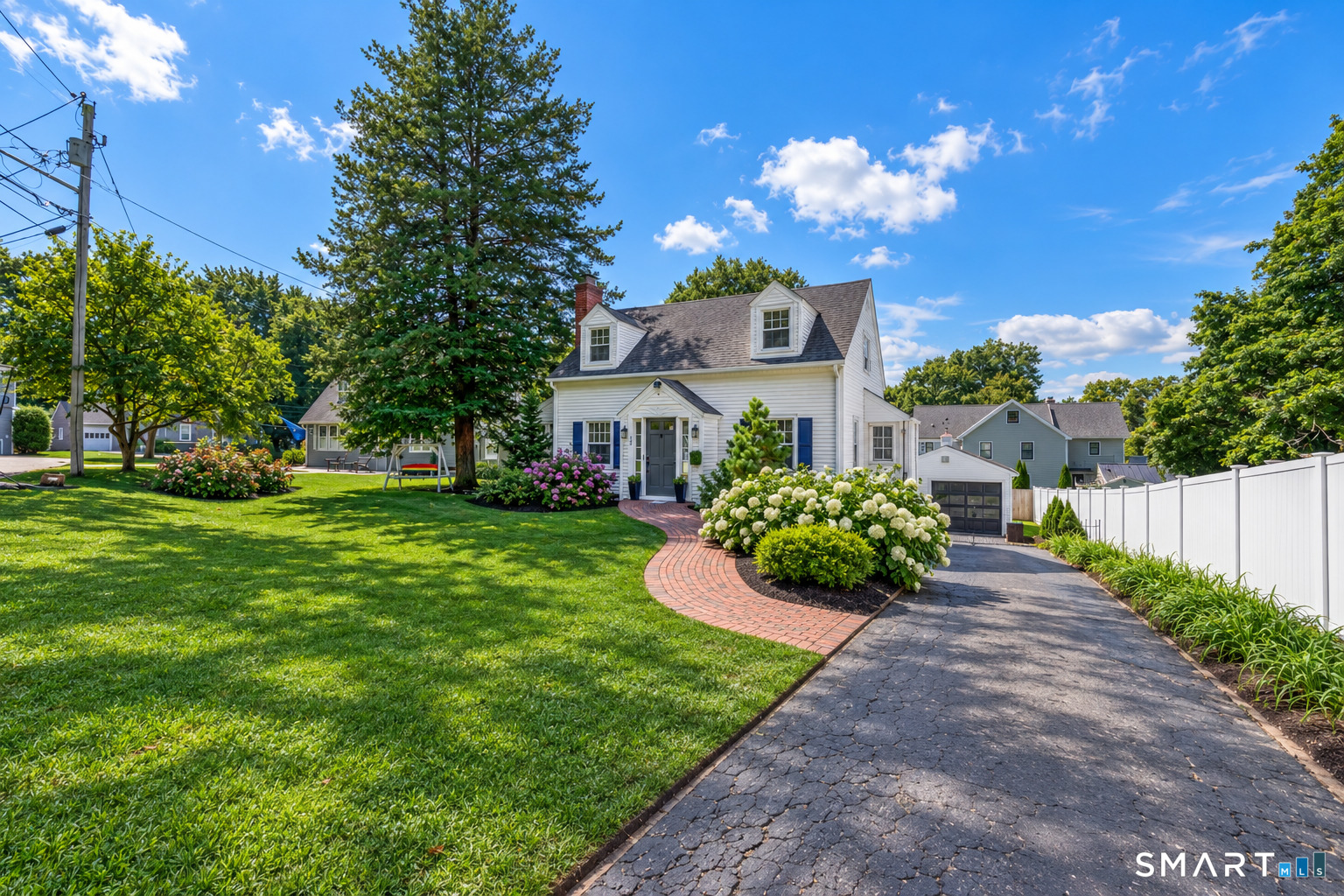 Incredible curb appeal defines this classic 3-bedroom, 2-bath New England Cape, ideally situated in a premier Stratfield neighborhood. Step inside to a warm and inviting living room anchored by a charming fireplace, perfect for relaxing or entertaining. The home offers a sun-drenched family room/den, a convenient main-level bedroom, a spacious deck overlooking a private backyard complete with an above-ground pool. The updated kitchen features sleek gray cabinetry and Corian countertops. Upstairs, you'll find a comfortable primary bedroom, a full bath, and an additional well-sized bedroom. The fully finished lower level provides versatile bonus space, ideal for a home office, recreation room, or additional living area. A detached garage with a striking modern glass garage door has been thoughtfully converted and is currently used as a home gym, adding even more flexibility to the property. Enjoy all that Fairfield, Connecticut has to offer, including access to award-winning schools and close proximity to Lincoln Park - just steps away. This is a home that truly combines charm, convenience, and lifestyle. Recent updates | repairs - New copper roof flashing just installed, entire interior freshly painted, hardwood floors recently sanded and refinished & new fan installed for the radon system. Noting to do but move in!