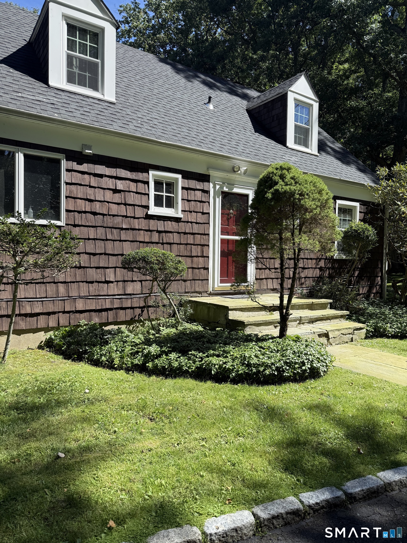 Beautifully situated Cape with serene views. Bring your ideas and make this home your own. Estate sale "as is". A great opportunity to own this special property.