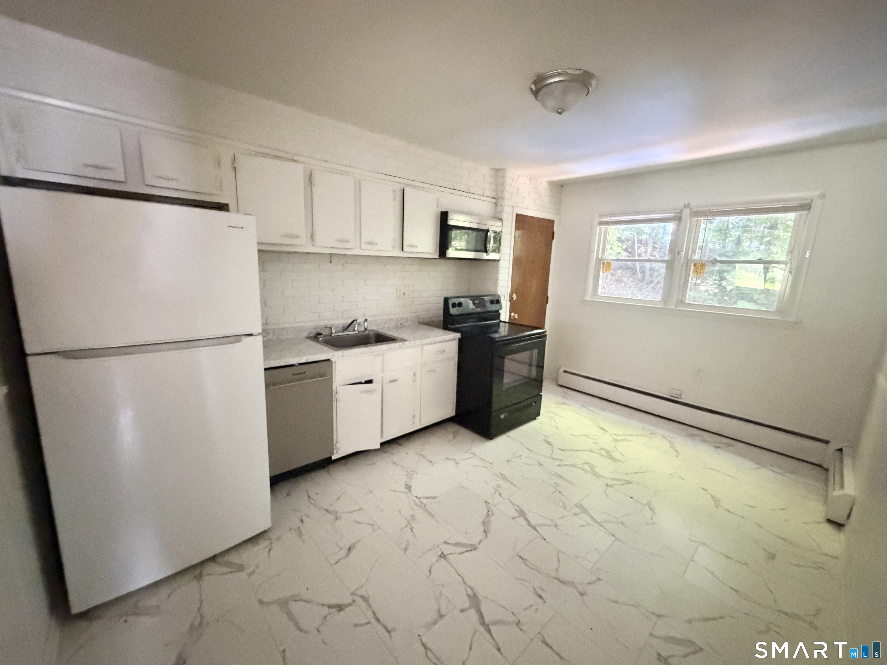Photo 3 of Condo for sale at 69 Oak Ridge Dr #51, New Haven, CT 06513 | MLS# 24196841 | Listing updated on 2026-09-14