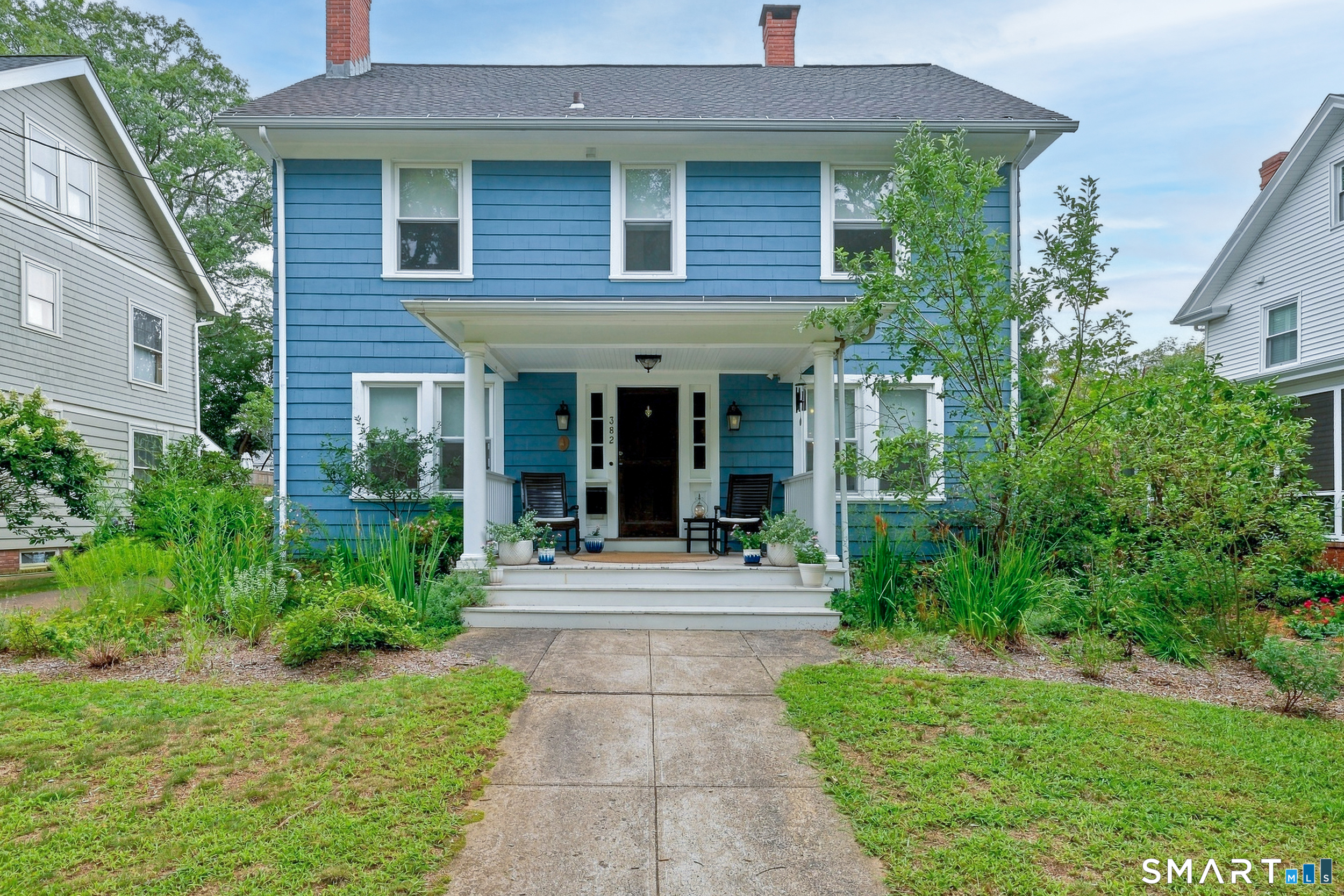 Exceptional 1920s Colonial in the heart of Westville, beautifully updated and meticulously maintained while retaining the character and craftsmanship of its era. This spacious home offers six bedrooms, 3 full and 1 half bath, hardwood floors throughout, custom built-ins, and a bright four-season sunroom. The recently remodeled kitchen features quartzite countertops, a breakfast island, and stainless steel appliances. The primary suite includes a beautifully appointed bath with walk-in shower, double vanity, and separate soaking tub. Outside, the fully fenced yard creates a private oasis with a patio, fruit trees, rose bushes, and lush mature greenery. And just across the street is Edgewood Park, providing a wonderful backdrop of trees and park views right from the front door. A rare combination of historic character, modern updates, generous living space, and an exceptional Westville setting.