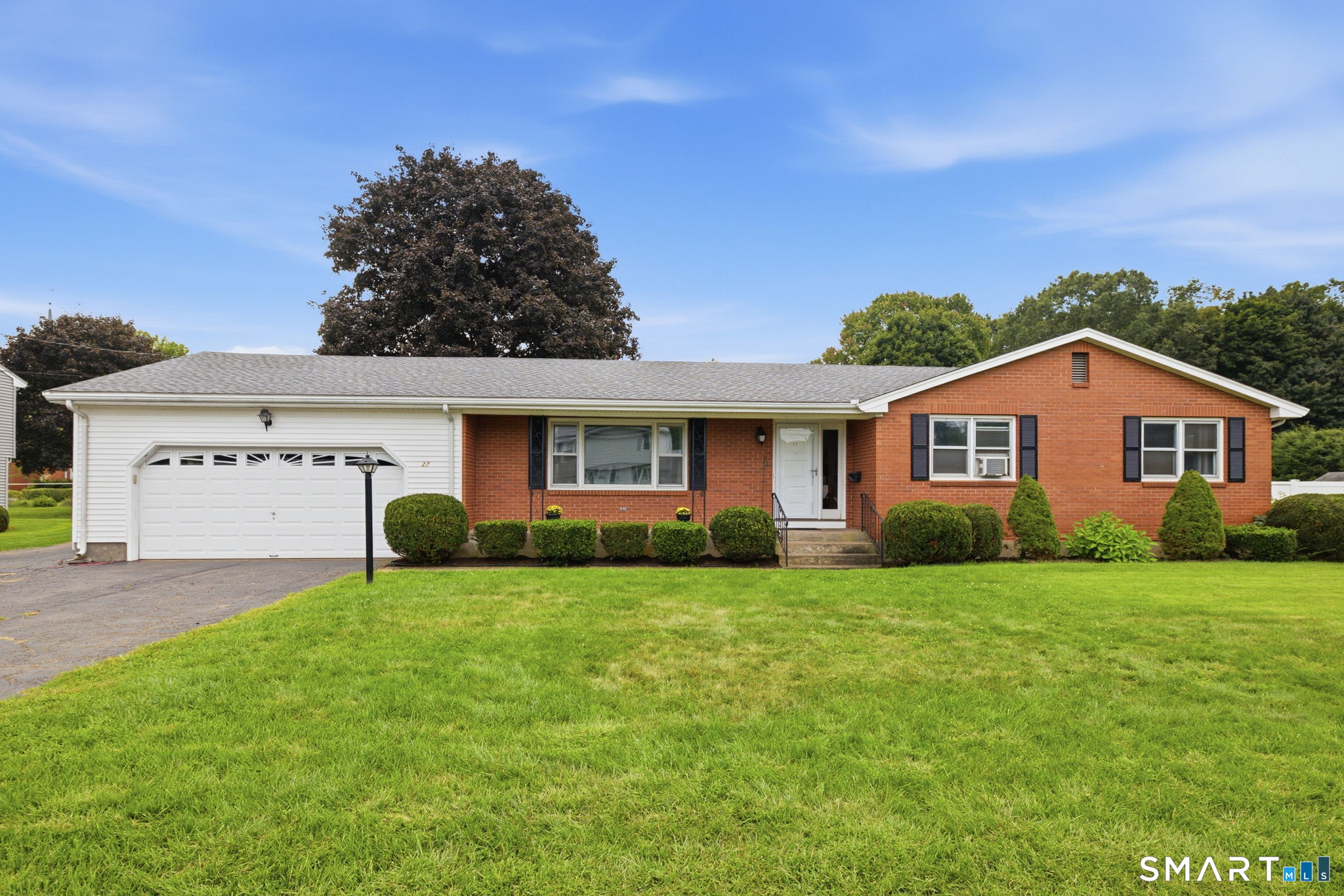 Well-maintained brick ranch located on a quiet cul-de-sac with a spacious, flat .52-acre backyard. Offering over 2,100 square feet of finished living space, this home features 3 bedrooms, 2 full bathrooms, a 2-car garage, and a finished lower level. The main level includes a bright living room with custom built-ins, updated flooring, and a functional eat-in kitchen with stainless steel appliances and plenty of cabinet space. The primary suite features a private full bathroom and walk-in closet. A screened-in porch overlooking the backyard provides a great space to relax or entertain. The finished lower level adds significant living space with a large family room featuring a fireplace, billiards/game room, and dry bar. Outside, the large, level backyard offers plenty of room for entertaining, recreation, or gardening and includes a fire pit. Additional updates include a newer roof and hot water heater. Conveniently located near Route 2, major highways, and Glastonbury Center.