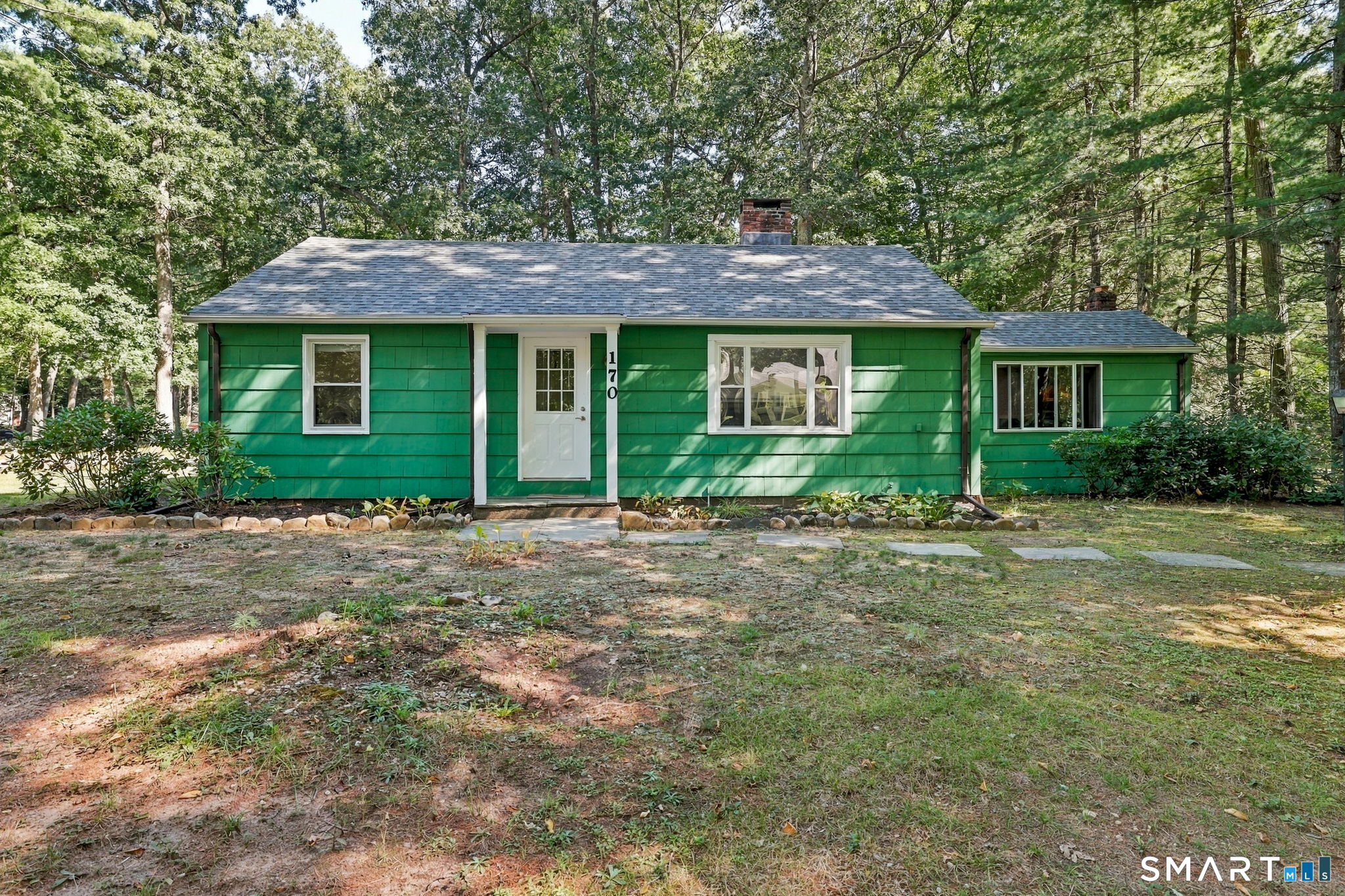 What a GEM! This West Simsbury cutie will win your heart over the moment you set foot inside. If you've been dreaming of Autumn in New England, there is no better place to experience it than right here in Simsbury! Imagine crisp fall mornings heading out to local favorites like Flamig Farm for hayrides, picking fresh pumpkins and apples at The Pickin' Patch, or enjoying wine tastings and corn mazes at Rosedale Farm & Vineyard-all less than 5 miles from your front door. Take in breathtaking autumn foliage views from the top of Heublein Tower at Talcott Mountain State Park, grab a craft brew at Talcott Mountain Collective, or enjoy leaf-peeping along neighborhood strolls on your quiet corner lot. Inside, the home offers a bright and turn-key layout with an updated kitchen flowing into the dining area and a spacious living room featuring a cozy wood-burning fireplace and built-in shelving-perfect for warming up on chilly fall evenings. The brilliant rear flex-room addition offers endless versatility as a family hang-out space, home office, or guest room. Complete with updated full baths, main-level laundry, and a private backyard patio, this charming home packs a punch!