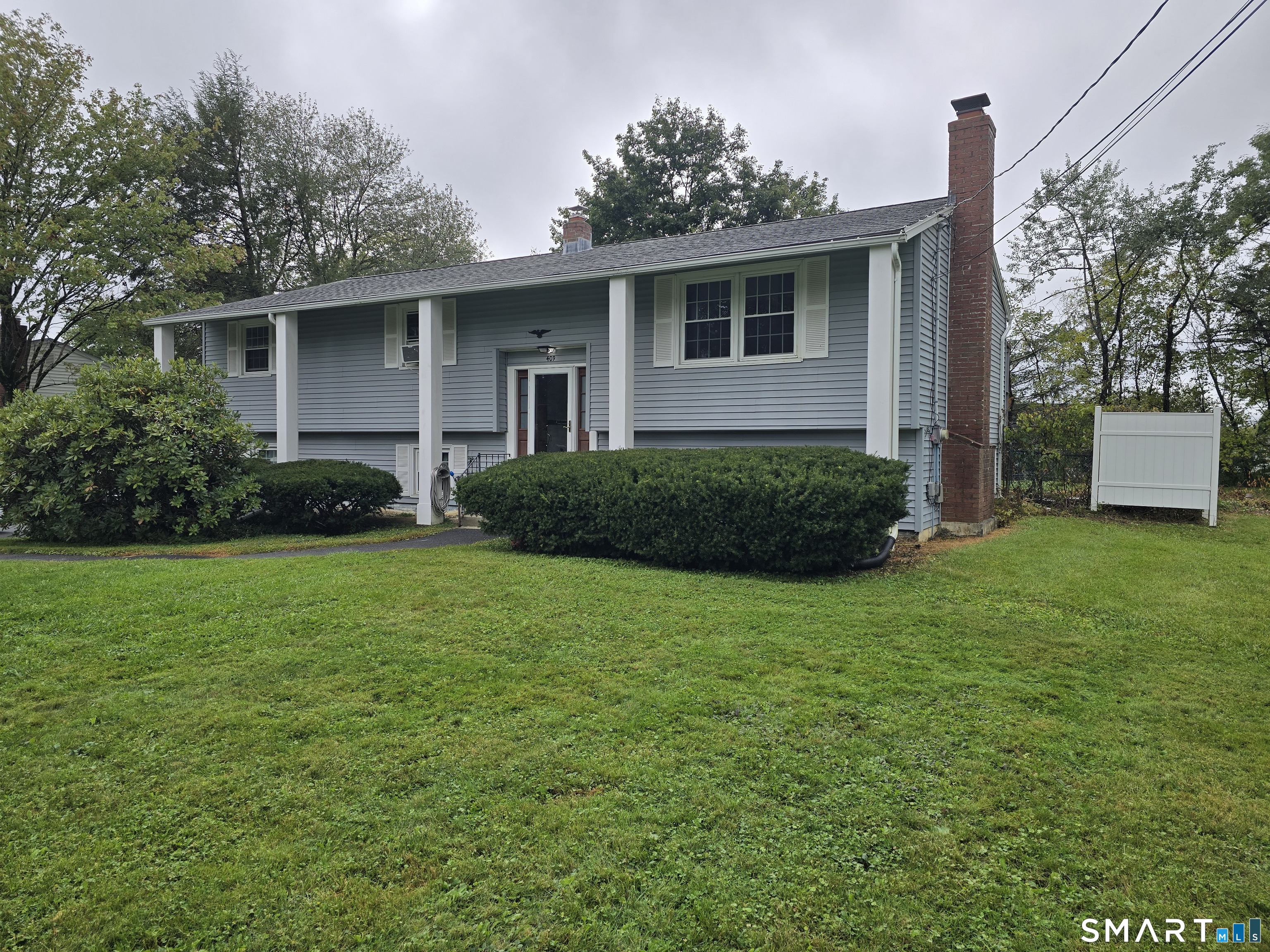 Desirable East Side Neighborhood! This is a must-see! Large raised ranch including a finished lower level. Great yard. Back Deck with a partially fenced-in backyard. Newer Kitchen and windows.Hardwood floors. The spacious lower level offers an open-concept family room, complete with a wood-burning fireplace. This property has natural gas heat and hot water, city water, and sewer. Convenient access to Routes 202 and 8. Abundant shopping nearby includes Target, Market 32, Wal-Mart, Starbucks, Dunkin, Panera, several banks, and Medical Walk-in centers. Don't pass this one up!