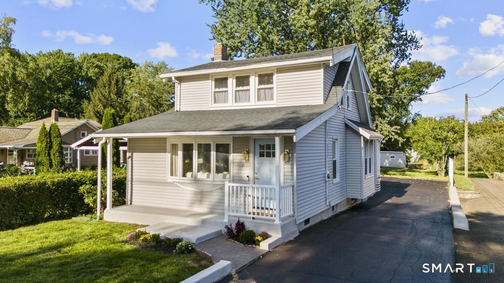 Welcome to 178 S Montowese Street, a beautifully refreshed 1920s bungalow in Branford's desirable Indian Neck neighborhood. Thoughtfully renovated while maintaining the charm of its original character, this 3-bedroom, 2-bath home offers a comfortable and inviting layout with stylish updates throughout. The main level features a bright living room, dining area, well-appointed kitchen, bedroom, and full bath, while the upper level offers two additional bedrooms and an another full bath. A partially finished lower level provides valuable flexible space for a home office, recreation area, gym, or storage. The brand-new mini-split system provides efficient cooling throughout the home. Outside, enjoy a level yard with room for gardening, entertaining, or simply relaxing. The home's location is truly special-just steps from the Long Island Sound and close to Foote Park, local restaurants, shops, athletic fields, downtown Branford, and the train station. Whether you're looking for a full-time residence or a shoreline getaway, this turnkey home offers the opportunity to enjoy everything that makes Indian Neck such a sought-after place to live.