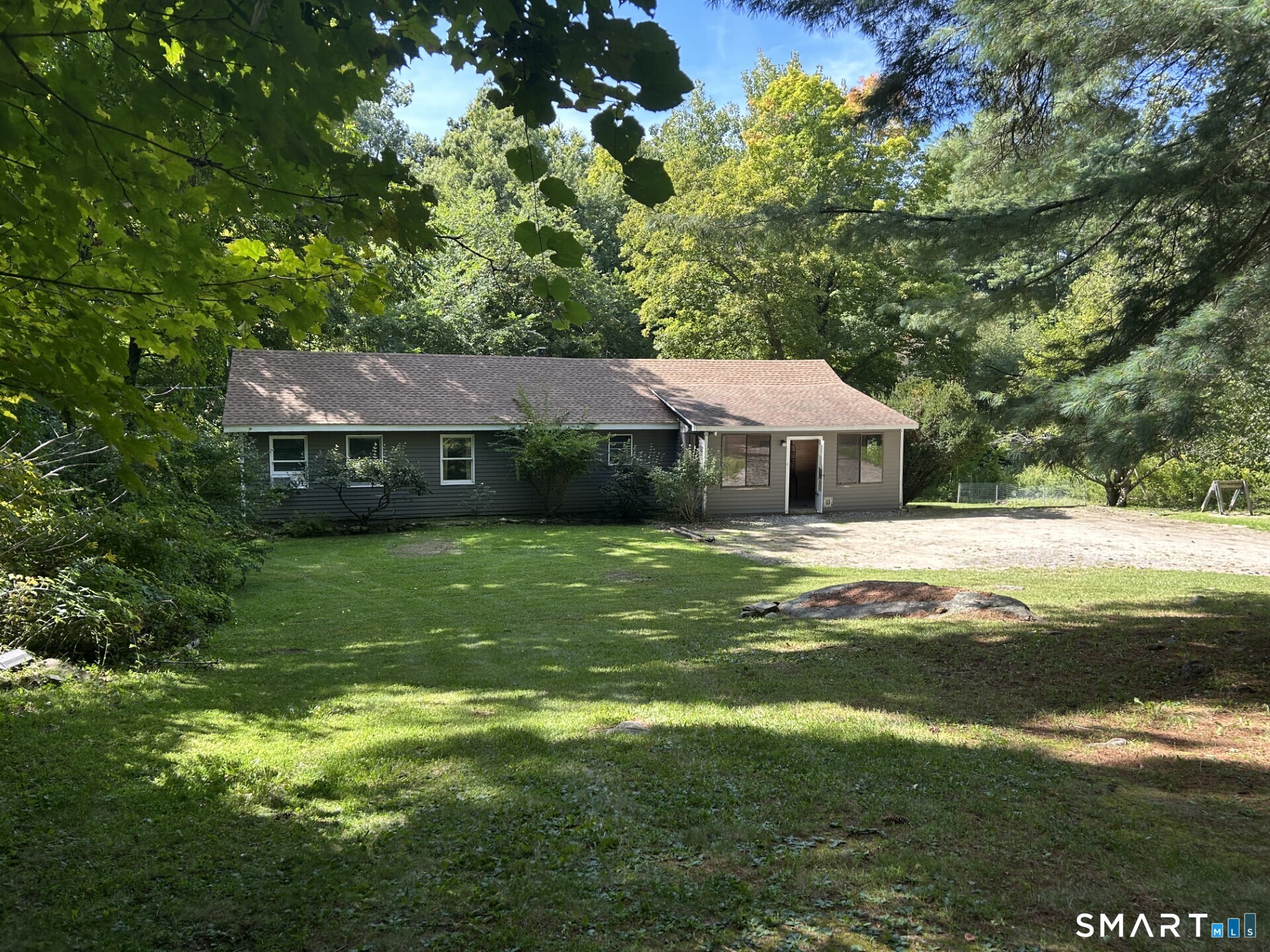 Set on 1.88 level acres in the Northville section of town, this 3-bedroom, 2-bath ranch offers one-level living in a private setting. Features include a large eat-in kitchen with new slider to a tiered deck, covered front porch, remodeled primary bath, and a new roof. The property offers a rare combination of usable yard space and seclusion, with room for gardening, recreation, or future enhancements. Some cosmetic updates are needed, but the home is solid and offers an excellent opportunity to build equity while customizing it to your taste.