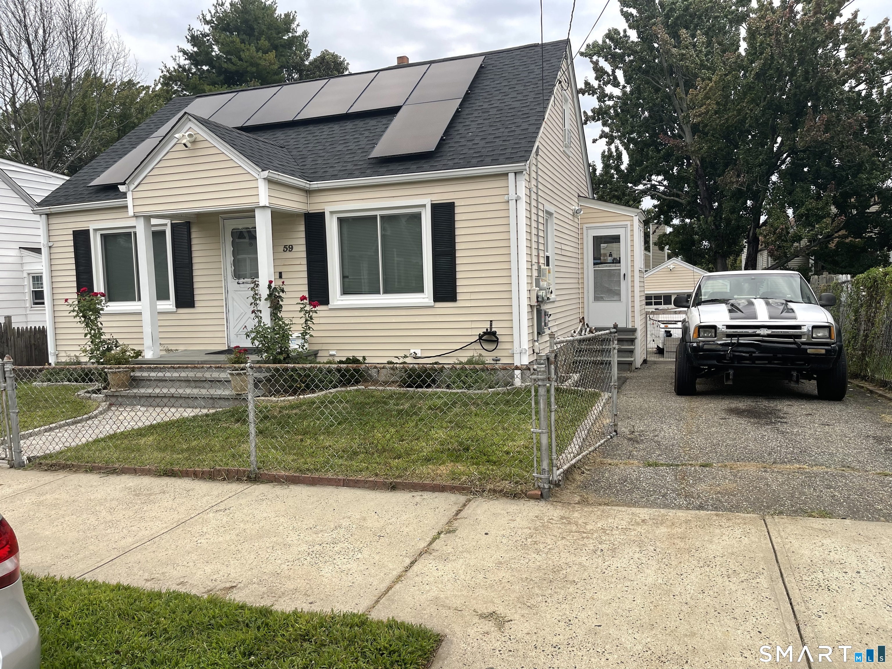 Remodeled Cap-Cod. Newer kitchen cabinets. New gas tankless heat and hot water. new gas stove. Finished basement. Move-in condition. One car garage and a private back yard. Large patio. Convenient to public transportation, Railroad and I 95.