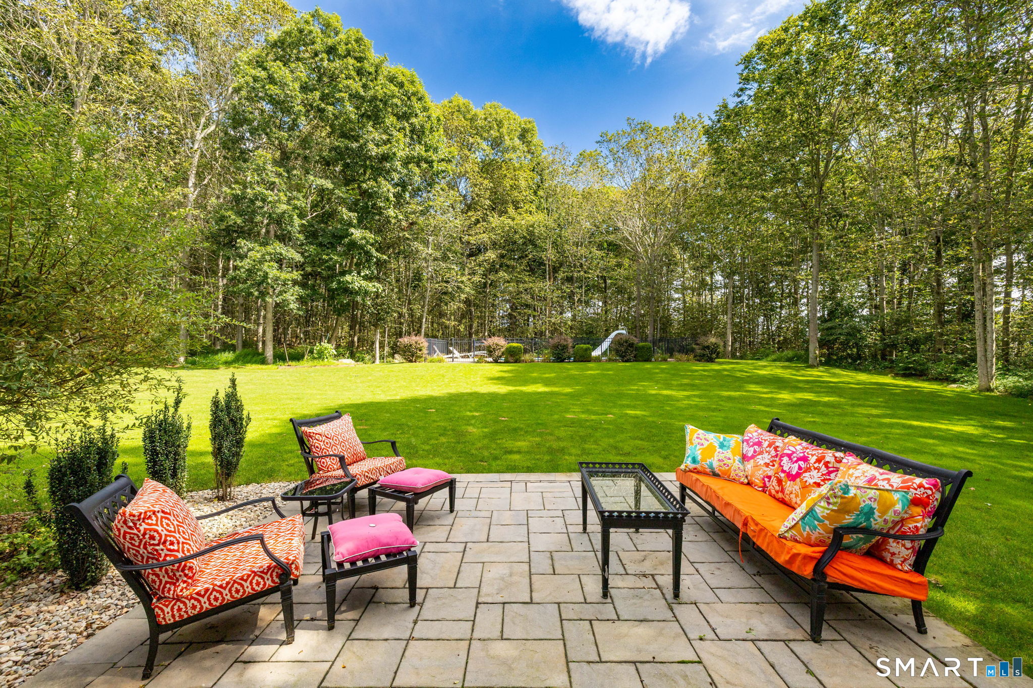 This patio was installed in 2024 and sits off of the family room.
