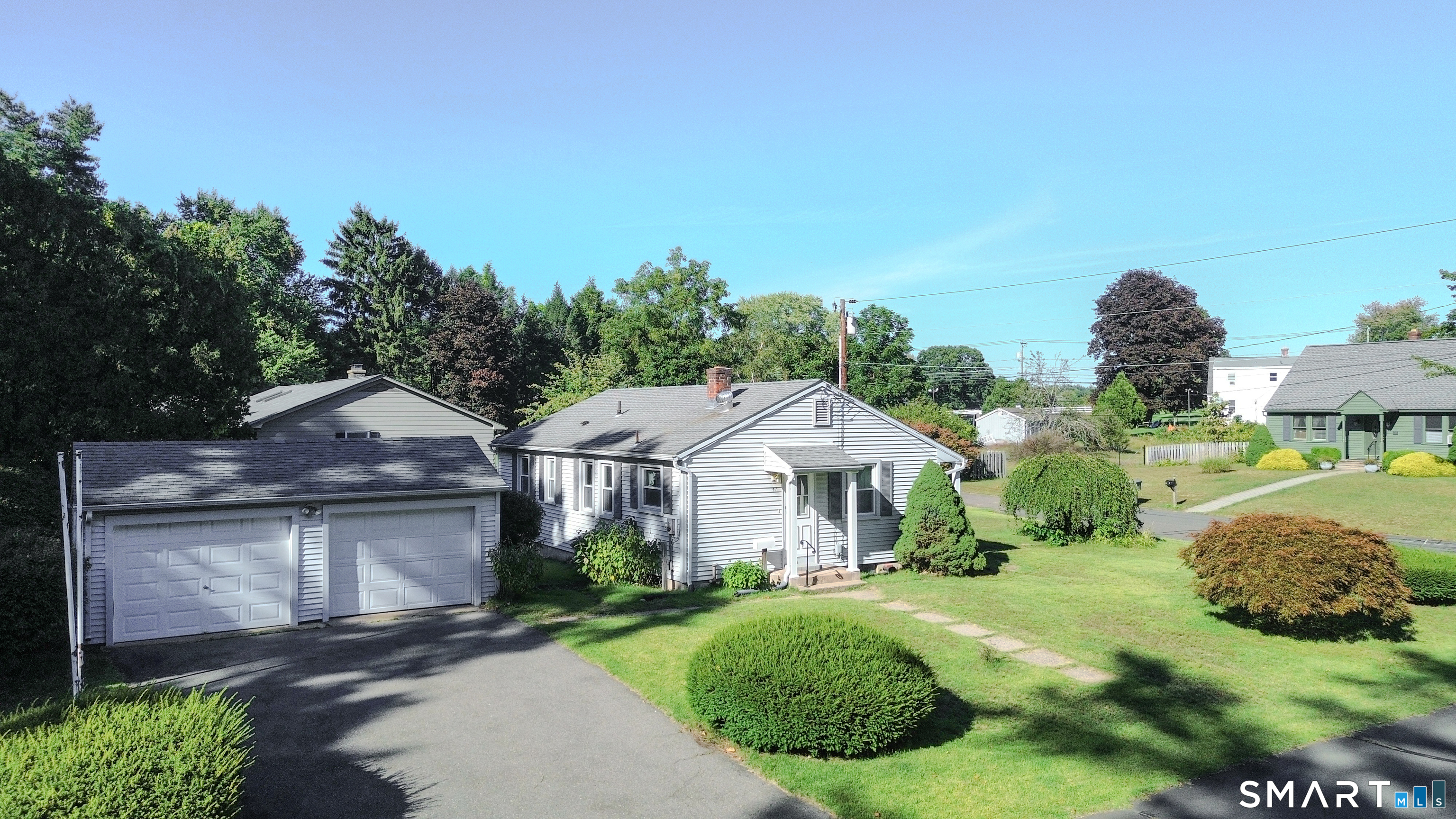 Desirable Hazardville Location! Welcome to this charming starter home nestled on a corner lot along a quiet dead-end street. Featuring a detached 2 car garage and numerous improvements over the years that include the kitchen, bath, furnace, oil tank, roof, siding, thermo windows, gutters and downspouts, gutter guards, driveway and appliances. This home offers a wonderful opportunity for anyone looking for a manageable home in a peaceful neighborhood with easy access to everyday amenities. Come see the possibilities, add your personal touches and make this house your home today!