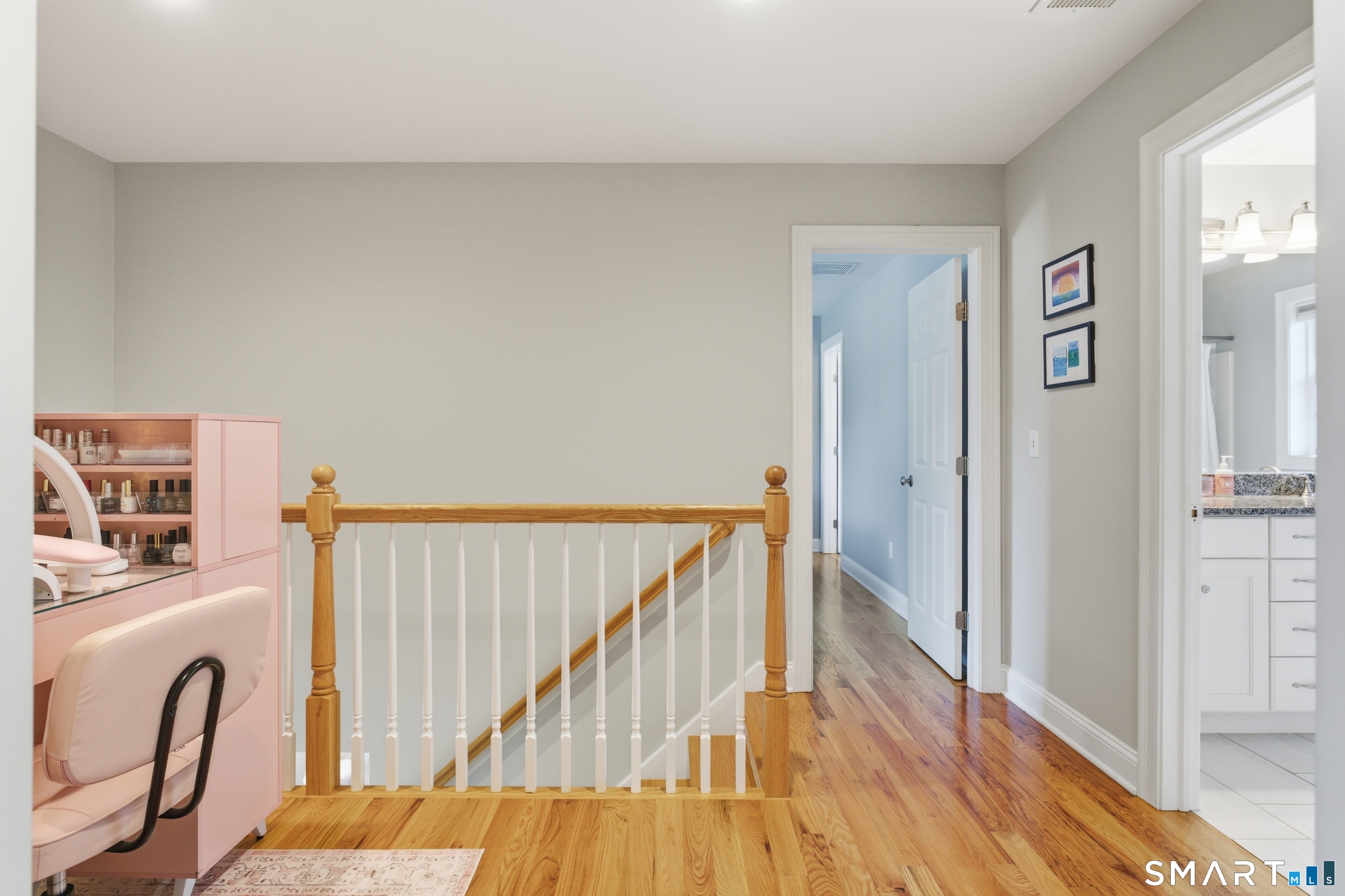 Spacious landing at the top of stairs.