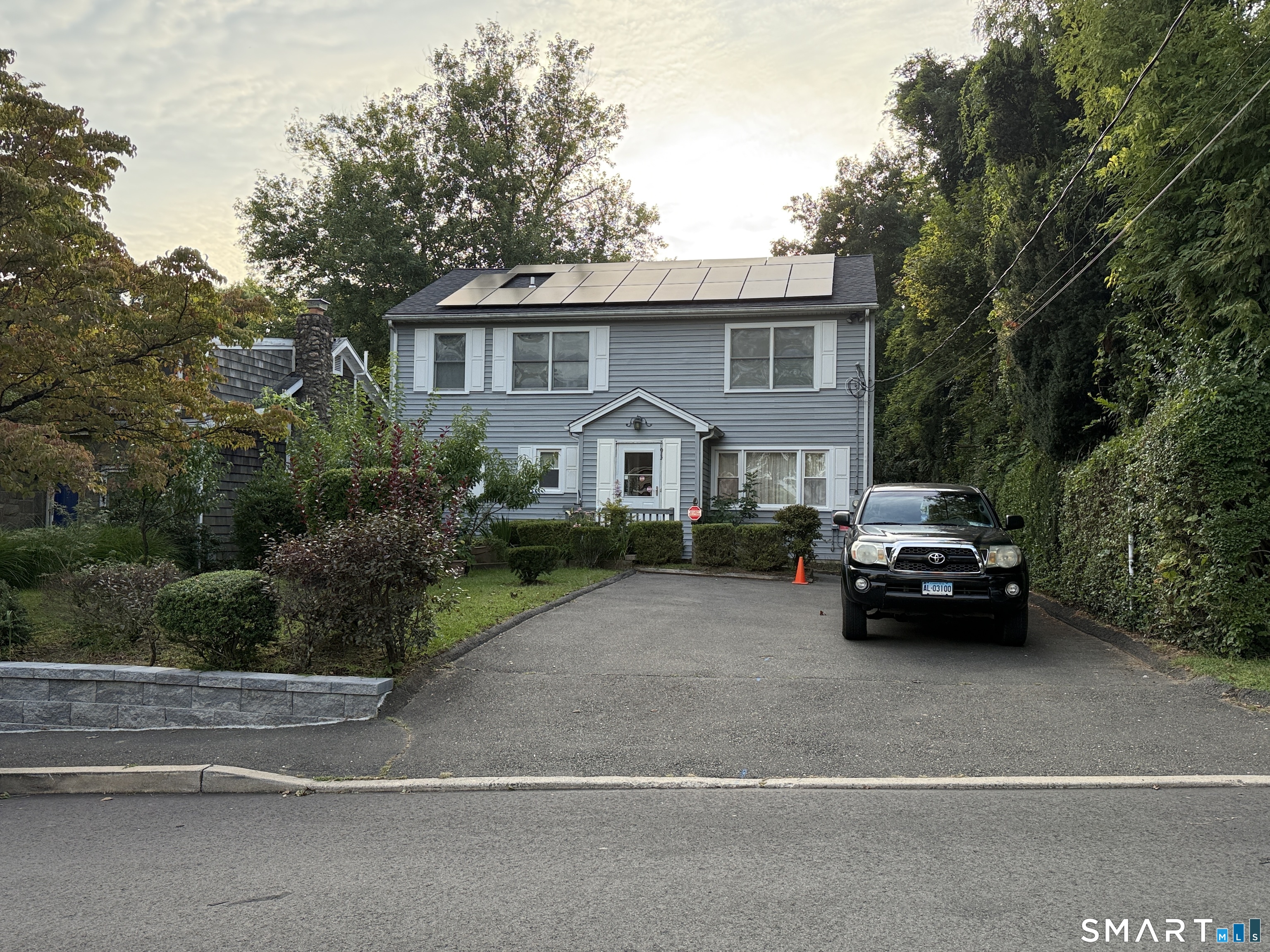 Great spacious colonial with bedroom on main level with open floor plan including a spacious family room. A gardeners delight with many fruit trees and with a double level of two yard tiers. Must see to appreciate all this home has to offer.