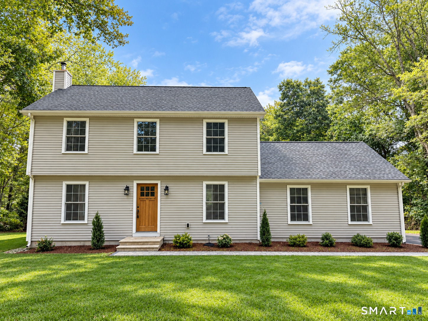 Welcome to this beautiful Colonial home, offering the perfect blend of classic charm, comfort, and space. Step inside to find gleaming hardwood floors and generously sized living areas filled with warmth and character. Spacious bedrooms provide plenty of room to relax and unwind, while the expansive living spaces offer a versatile layout ideal for both everyday living and entertaining. At the heart of the home is a beautiful, inviting kitchen featuring ample cabinetry, generous counter space, and plenty of room for gathering and entertaining. Whether preparing everyday meals or hosting family and friends, this welcoming space flows seamlessly with the rest of the home. Situated on an impressive lot of over two acres, the property offers exceptional privacy and an abundance of outdoor space to enjoy. Whether hosting summer gatherings, creating your own backyard retreat, or simply enjoying the peaceful surroundings, this expansive property provides endless possibilities. With its spacious interior, beautiful hardwood floors, inviting kitchen, and private setting, this Colonial is a wonderful place to call home.