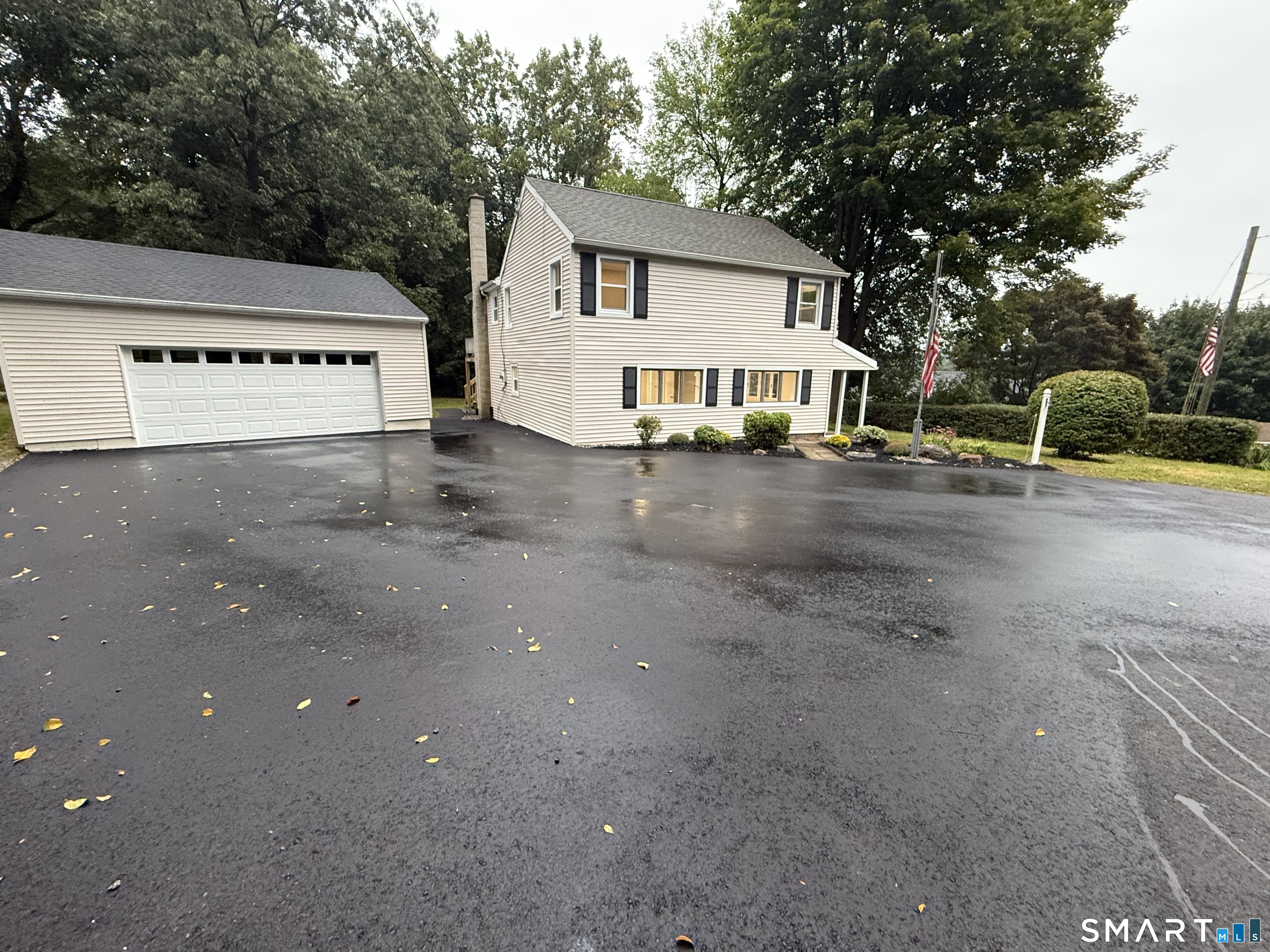 Welcome to 241 Lewis St. located right outside of Naugatuck State Forest. A remodeled 4 bedroom 2 full bath house with an In-law apartment on the first floor. New Kitchen cabinets and granite counters, new floors throughout, new tiled shower and vanities, new siding on the house and the oversized two car garage, new garage door and garage roof, new deck stairs, a freshly paved driveway and more!! Enjoy spending time on the spacious deck overlooking the back yard in this quiet neighborhood. Come see this move-in ready house today!!