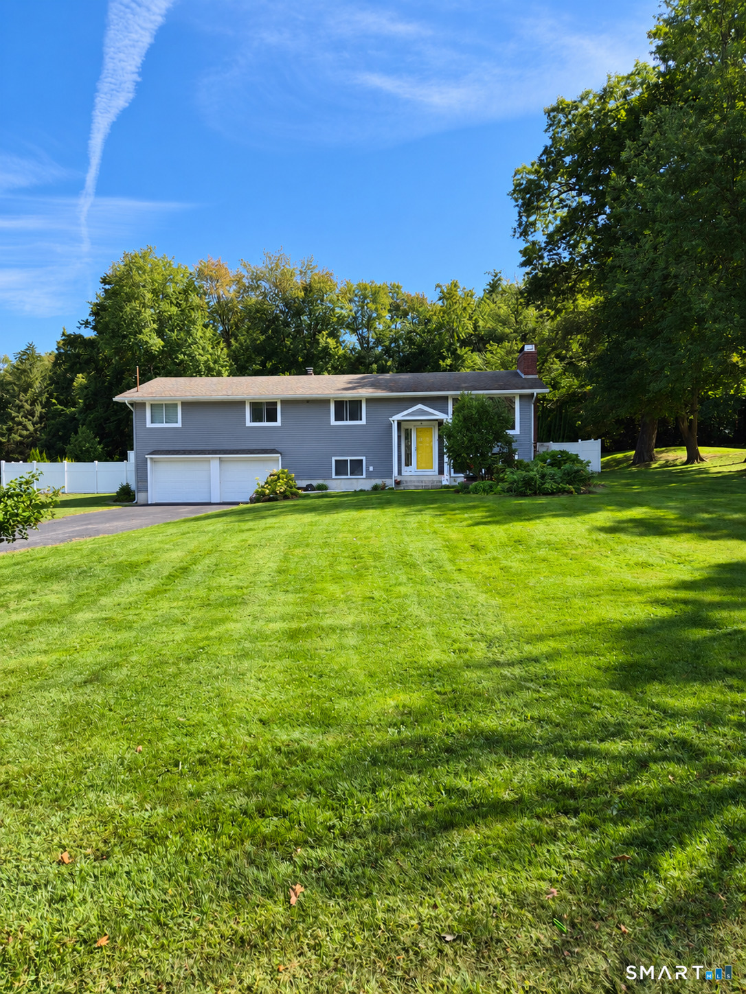 New to the market, raised ranch in quiet neighborhood, with lots of upgrades, brand new windows, siding, gutters, 30x16 trex deck and adjacent covered porch, fenced in back yard, heated 2 car garage, finished basement with movie theater, remodeled kitchen, 2 fireplaces with inserts in LR and FR, remodeled foyer, remodeled 2 full baths, granite countertops, every exterior wall sheetrock replaced and all exterior walls insulated, 3 big picture windows. Heat pump with heat and central air, new Samsung appliances. Flat big back yard with vinyl fence, 60+ green giants for privacy Upgraded electrical with generator hookup. More pictures to come.
