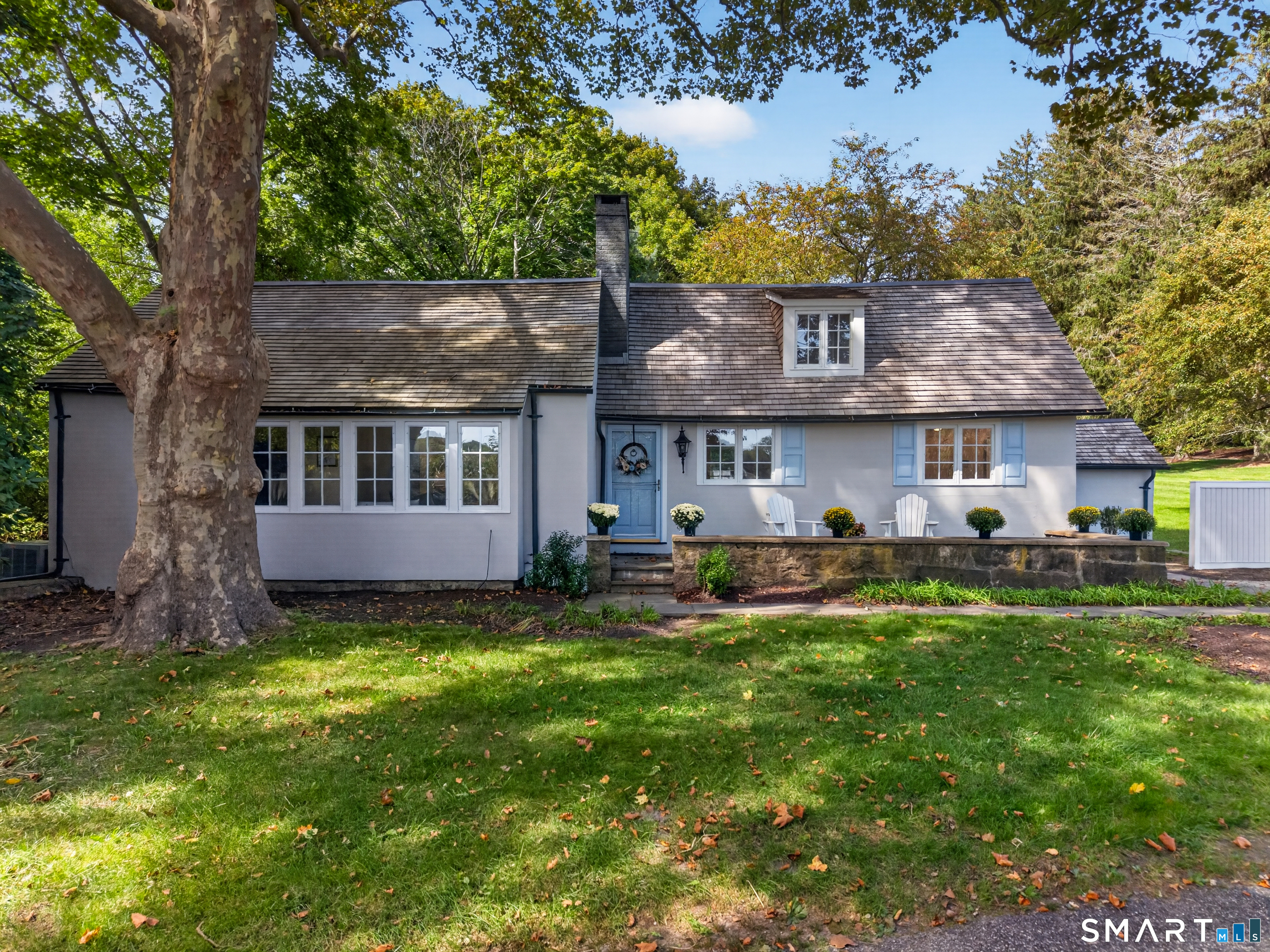 Make this enchanting storybook home your own special year-round getaway. Nestled on the outskirts of historic Old Lyme Village, the Gate House is being offered for the first time in decades. Once part of an exclusive executive estate, the charming Gate House sits on nearly one acre of land in a unique and pastoral setting. This 2-bedroom, 2 full bath home has been lovingly restored, with newly designed open kitchen complete with new stainless appliances, newly designed master bath, and stunning hardwood floors throughout. A spectacular soaring ceiling in the living room with walls of glass and charming fireplace set the stage for the perfect place to relax after a busy day of kayaking, sightseeing, or shopping in the many seaside villages along the coastline. The Gatehouse sits on the edge of the Lieutenant River with expansion and water access potential following town approval processes.