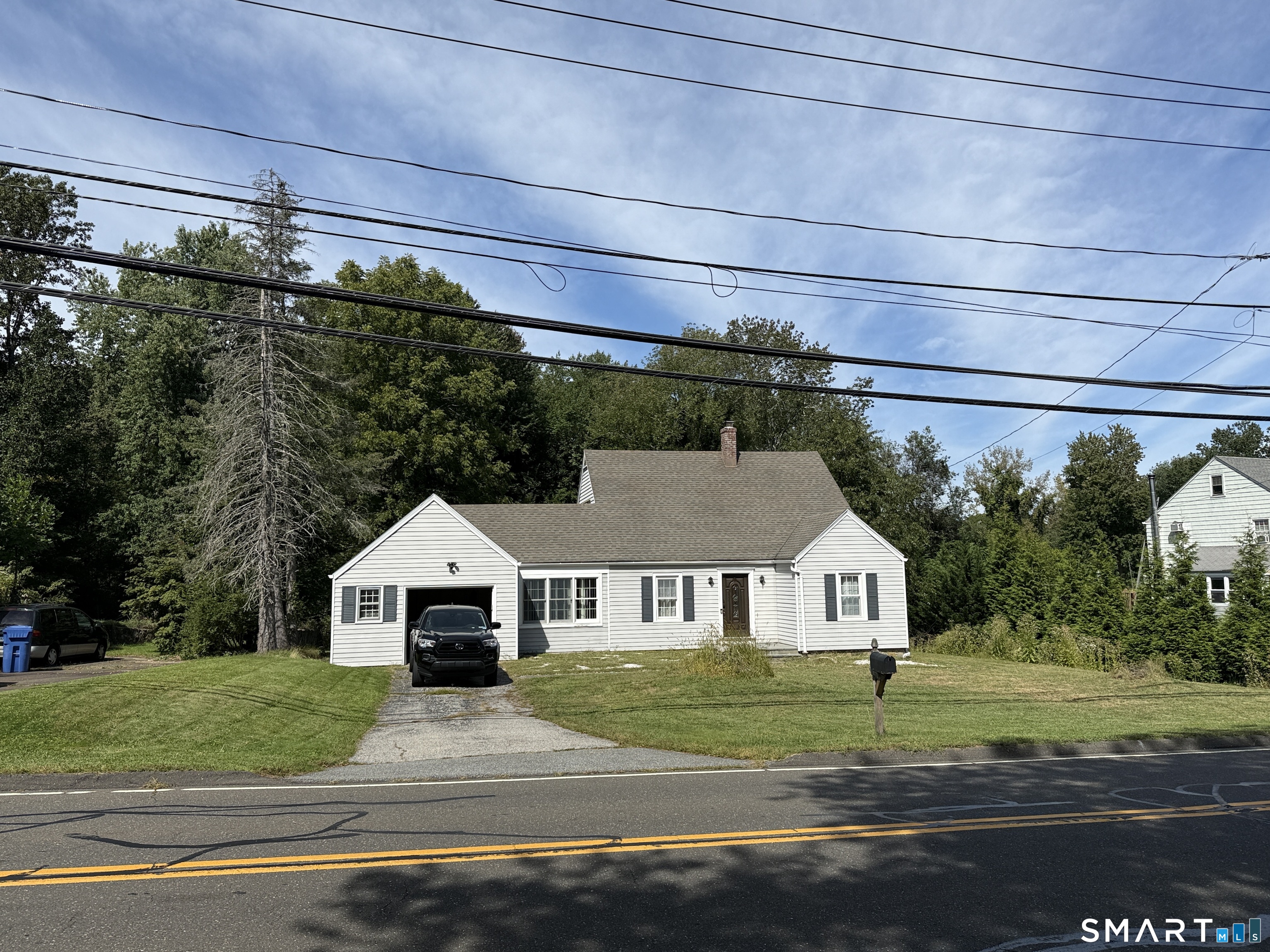 Conveniently located in the Tashua section of town close to schools, parks, shopping, restaurants, and highways. Newly renovated EIK offering hardwood floors, custom wood cabinetry with ample granite counterspace, stainless steel appliances, and tiled backsplashes. This sun filled home offers great living areas, hardwood floors, replacement vinyl windows, and central air throughout. Step down into the private office with sliders to the rear stone patio. Three generously sized bedrooms, and two remodeled full baths. Large unfinished basement adds great storage space.
