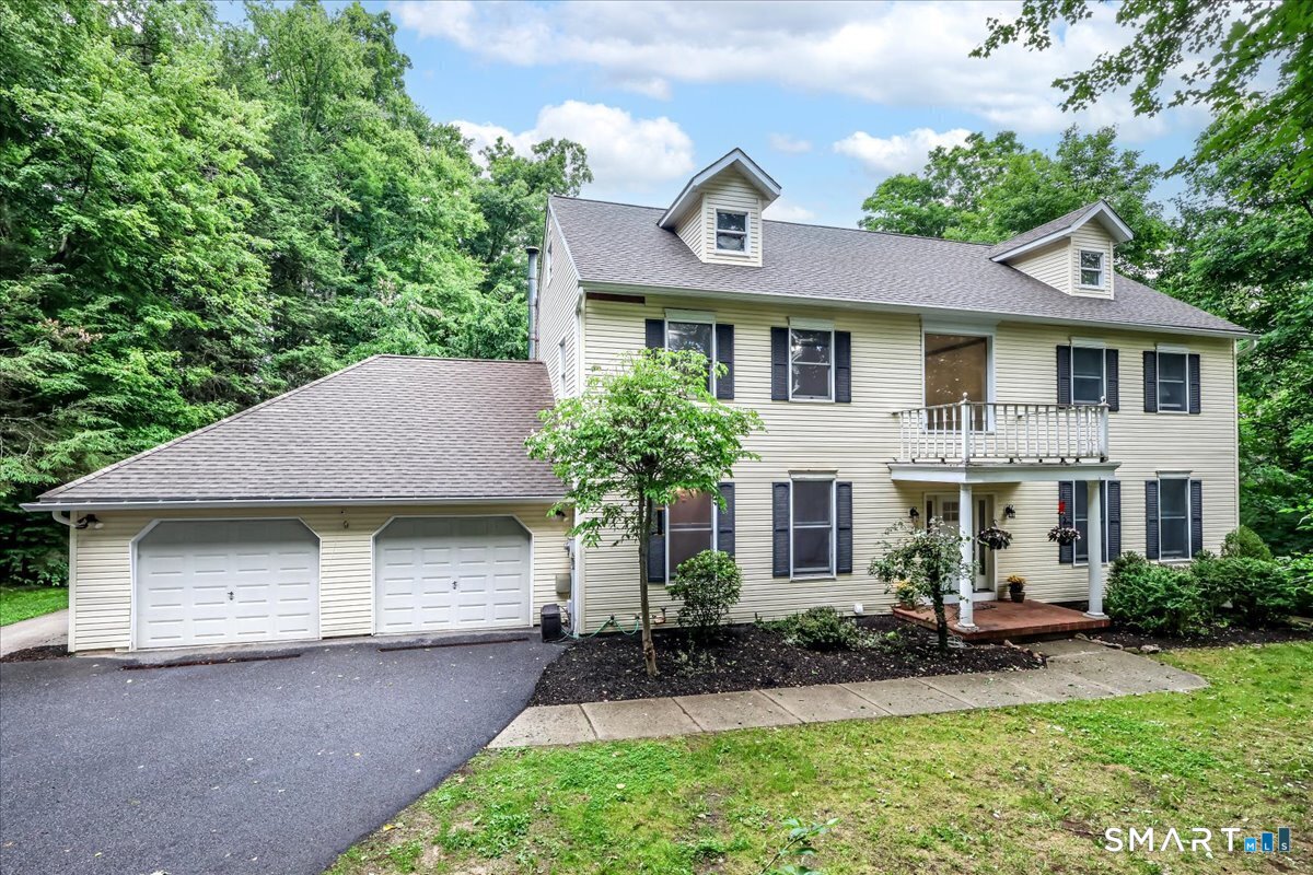Located in sought-after Greenknoll Drive located in the heart of Brookfield, this spacious Colonial offers a rare and flexible floor plan with six bedrooms and four full baths, connected to PUBLIC SEWER. A main-level bedroom and full bath provide the ideal setup for guests, multigenerational living, or a home office. Upstairs you'll find four additional bedrooms, while the lower level features a sixth bedroom creating excellent potential for an in-law or guest suite with full bath and direct access to its own private deck. This home has been thoughtfully updated throughout. The kitchen was totally remodeled in Fall of 2025, and all bathrooms have been tastefully renovated as well. New laminate flooring has replaced the majority of the carpeted areas beautifully complementing the exsisting hardwood floors creating a cohesive, move-in ready interior. Combinding generous living space, modern updates, and highly desirable Brookfield location, this home is a rare opportunity not to be missed.