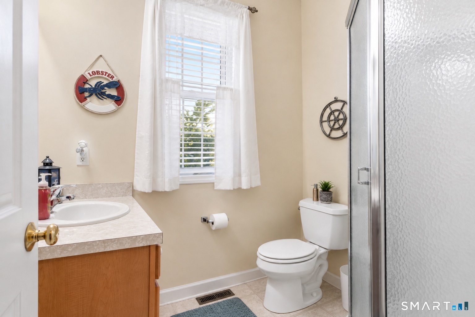 Main Floor Full Bath with Shower Stall