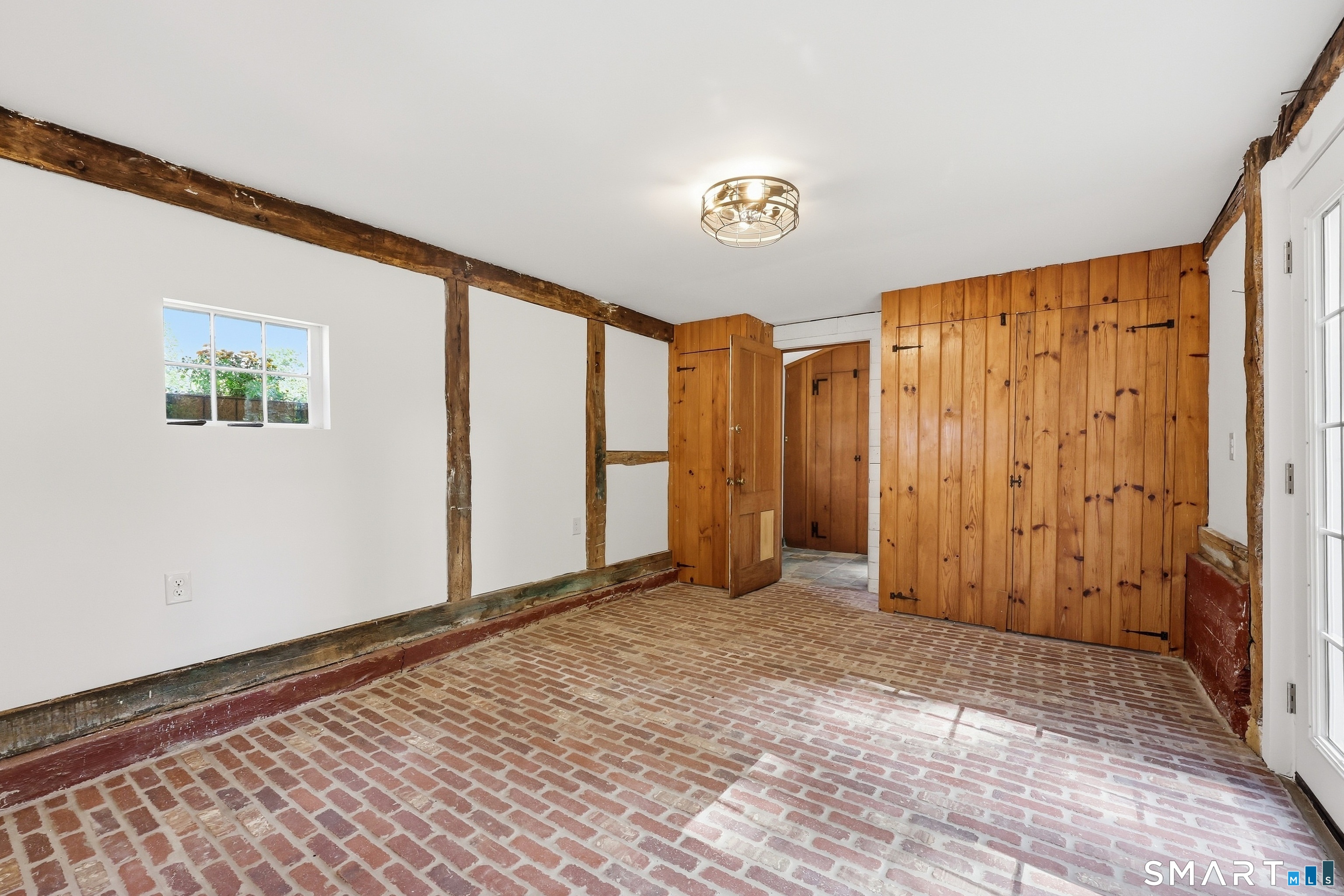 Sunroom is ideally suited for a home office or potential 5th bedroom.