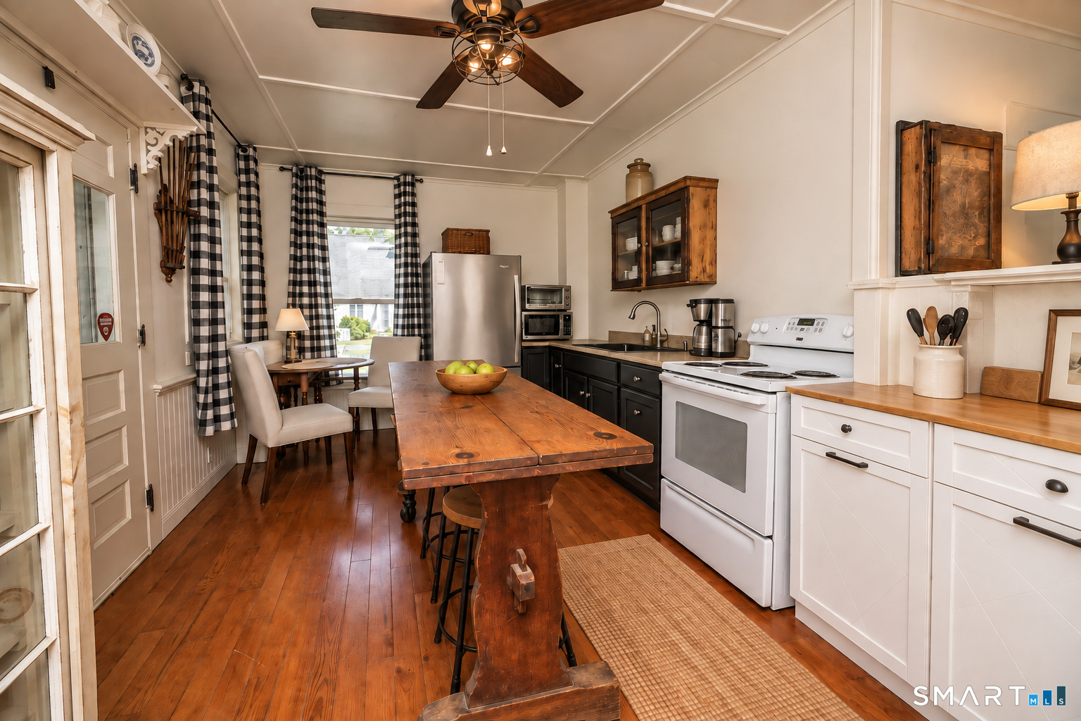Second main-level kitchen with its own separate entrance, offering added flexibility for a variety of living arrangements and uses.