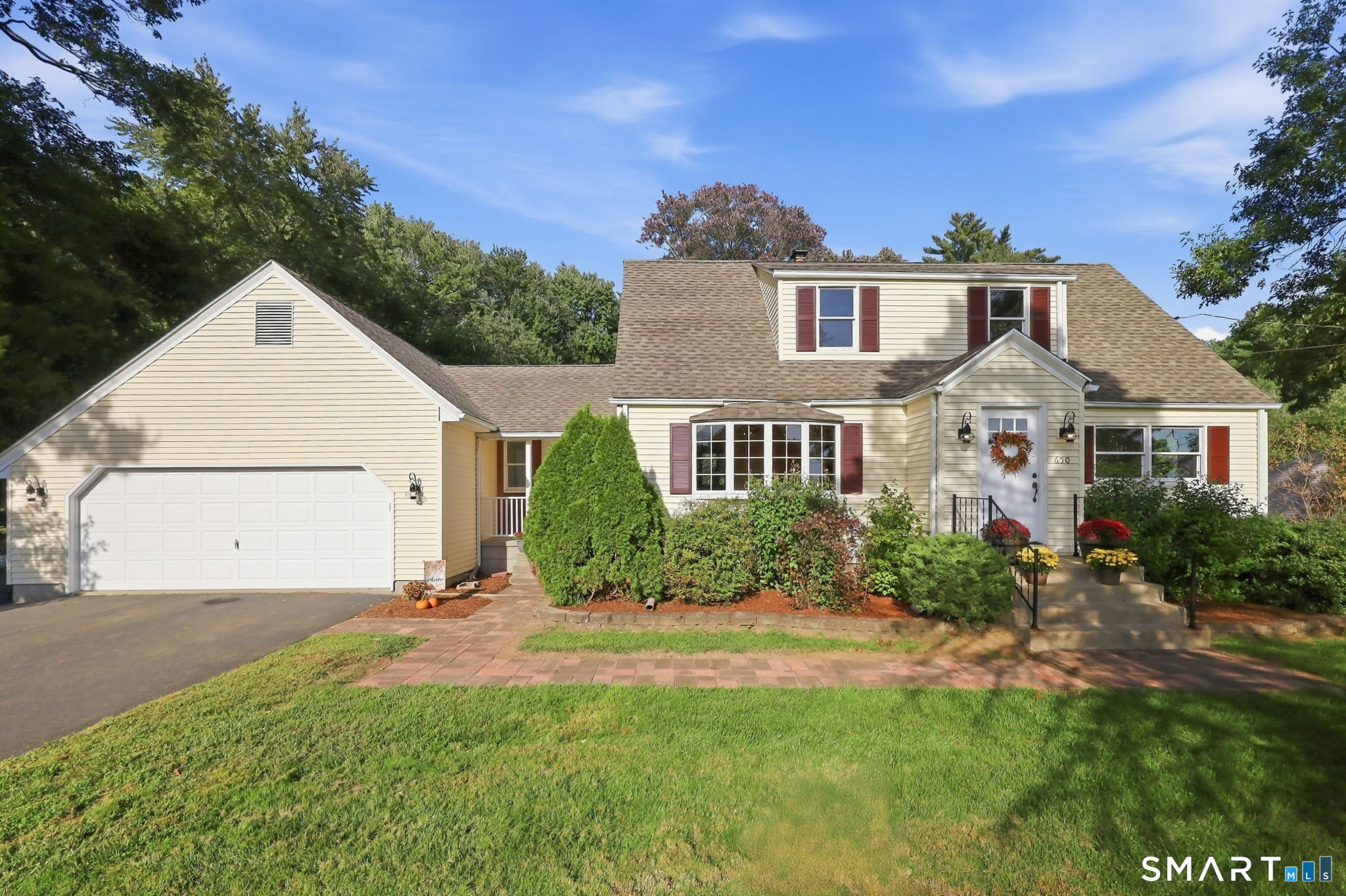 Well-maintained Cape-style home offering a versatile 3-4 bedroom designed to suit a variety of lifestyles. A welcoming front porch, the interior features comfortable living spaces, flexible bedroom or office options. Living room features hardwood floors, bay window and abundant natural light. The eat in kitchen features brand new stainless appliances, backsplash, center island and breakfast bar with plenty of cabinets and counter space. Sliding glass doors lead to the deck overlooking 2.1 -acre lot offering privacy, mature landscaping, and plenty of room for outdoor enjoyment. Convenient first floor bedroom and 2nd bedroom or office space with french doors, full remodeled bathroom with walk in shower, and washer and dryer. 2nd floor features a loft/den area with built in bookshelves, walk in closet for storage. The primary bedroom with three closets for plenty of storage and new ceiling fan. 2nd floor remodeled bathroom features brand new quartz vanity, jacuzzi tub and walk in shower. Recent updates include brand new Roth oil tank and carpet in bedrooms. Replacement windows, 2007 roof and Thermopride heating system, 40-gallon economical propane HW heater, central air! Oversized attached 2 car garage ideal for all your toys and vehicles! Ideally located in new Pleasant Valley grammar school, shopping, dining, and transportation, this move-in-ready home is a wonderful opportunity in a sought-after community.