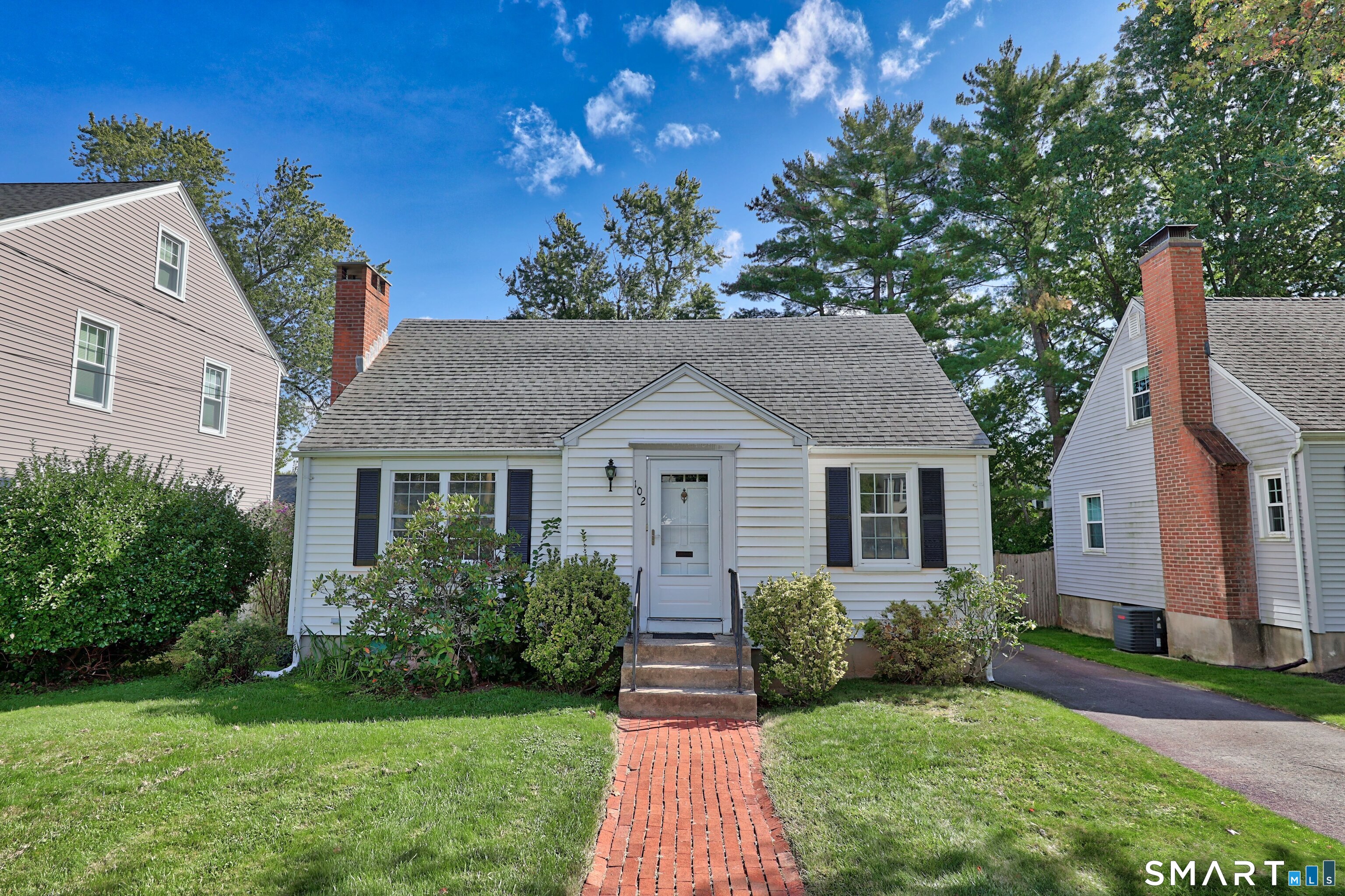 Solid, well-built 1949 home just a block from West Hartford Center, offered by the estate and ready for its next chapter. Original hardwood floors and a classic masonry fireplace anchor the living room, giving this house real character that's hard to find in newer construction. Comfortable, well-proportioned rooms throughout offer a great canvas to make it your own. A detached garage and a level 0.14-acre lot add everyday convenience, and the unfinished basement is a blank slate - storage today, finished space tomorrow. Heat is classic hot-water radiator (oil); cooling is by window unit. A rare opportunity to bring your own updates to a solid home steps from the shops, restaurants, and energy of West Hartford Center. Sold as-is. Estate sale - sale subject to probate court approval. Schedule your showing today.