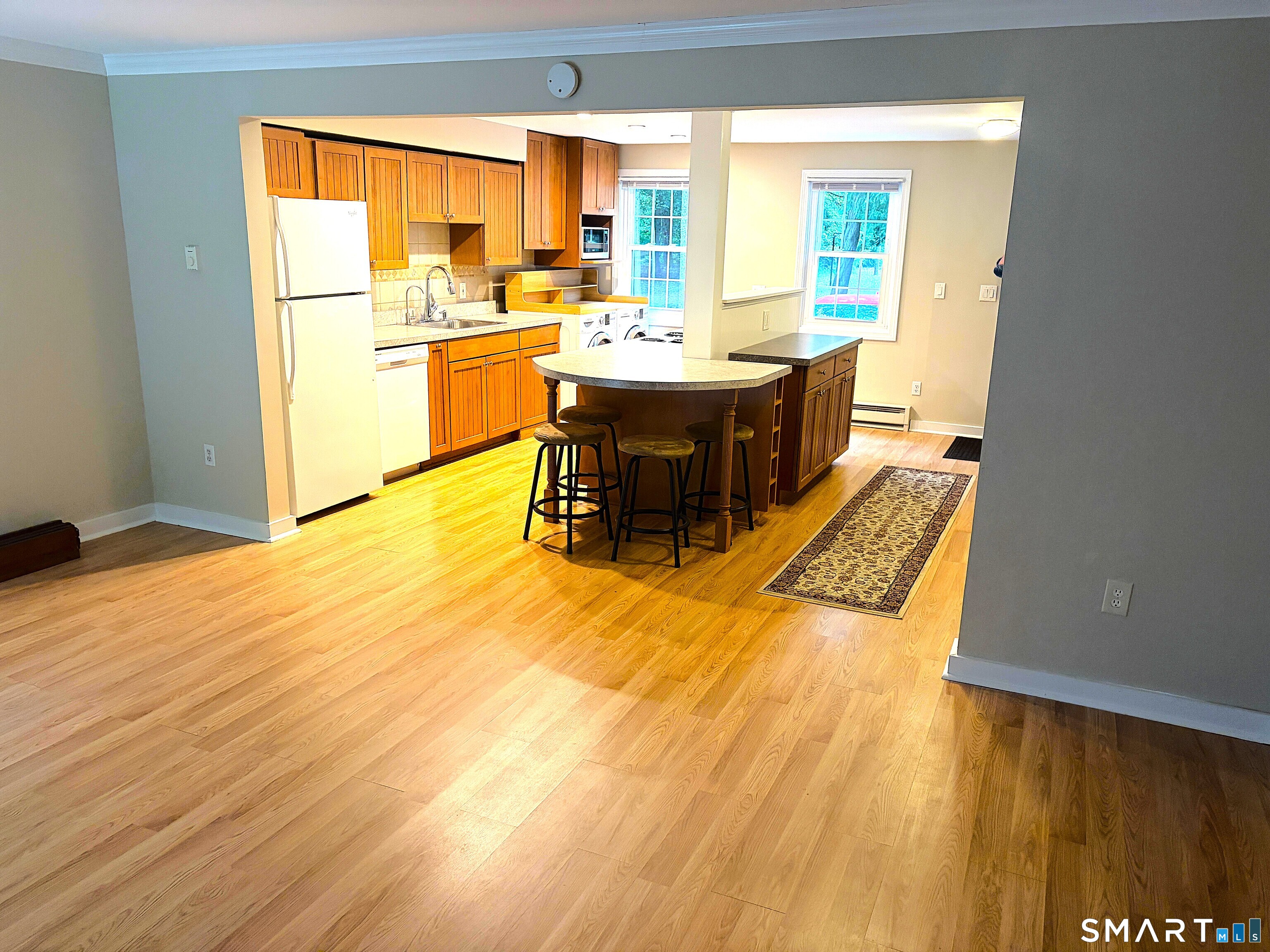 Spacious Living Room with Hardwood Floors
