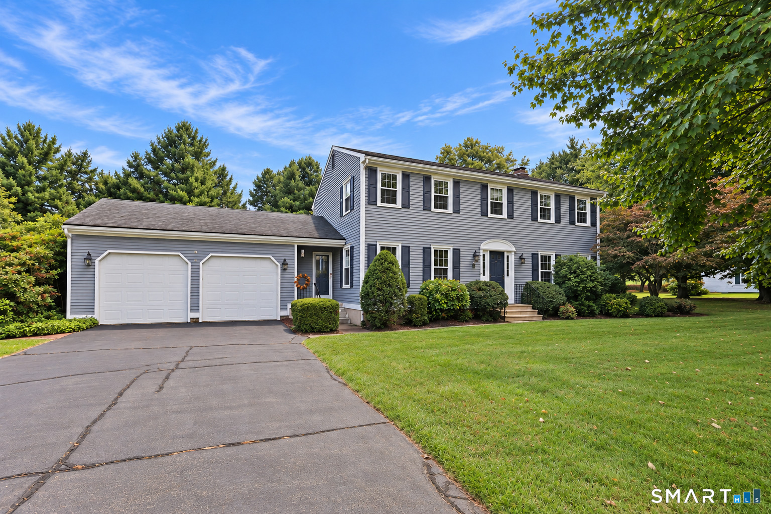 Welcome to 48 Hawthorne Mead Drive, a beautifully maintained 4-bedroom Colonial in Glastonbury, offering approximately 2,244 square feet plus extra square footage in lower level, all set on a level .92-acre lot in the Hebron Avenue School District. Updated kitchen features granite countertops, a granite sink, updated lighting, instant hot water dispenser, a newer dishwasher, pantry storage, & an easy flow to the spacious family room with custom built-ins and a fireplace (HW under carpet!). Formal living and dining rooms, first-floor laundry, a convenient half bath, and hardwood flooring beneath portions of the carpeting. Upstairs are 4 bedrooms, including a generous primary suite with an updated tiled bath and rain shower, plus a second full bath with dual sinks. Additional highlights include replacement thermal-pane windows, a newer water heater, central air, natural gas, public water and sewer, refreshed chimney work, exterior painting completed in 2024 with AZEK trim added where needed, a walk-up attic, & excellent storage. Expansive, private backyard was the go-to house for neighborhood parties, graduations, lawn games, & celebratory milestones. Located on a quiet horseshoe-shaped street with no through traffic, less than 5 minutes from Hebron Avenue Elementary School, 10 minutes away from Gideon/Smith/GHS & offers easy access to Glastonbury Center, South Glastonbury farms and orchards, local restaurants, Manchester, & Route 2; beaches & day trips are a breeze from here!