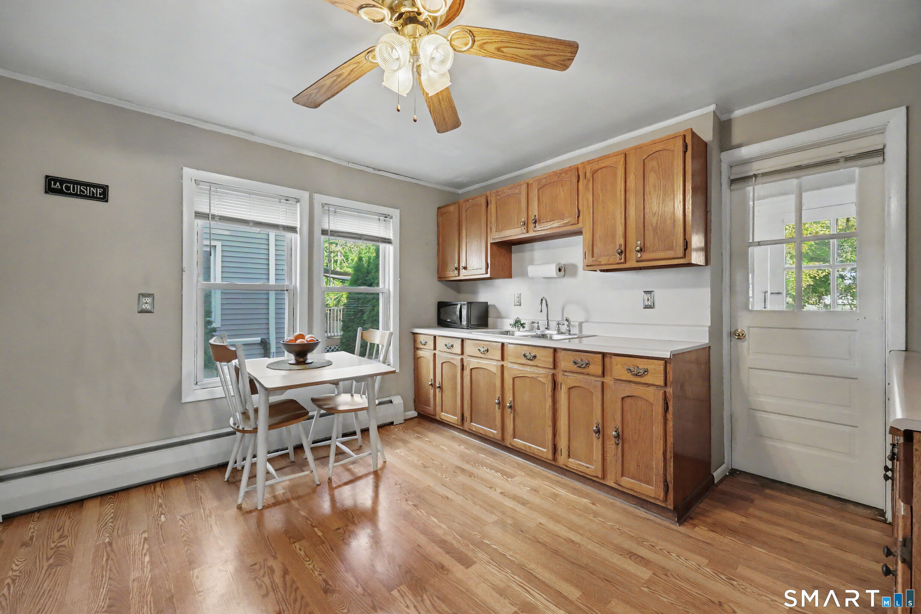 Door in kitchen leads to Pantry/mudroom and then out back to deck & yard