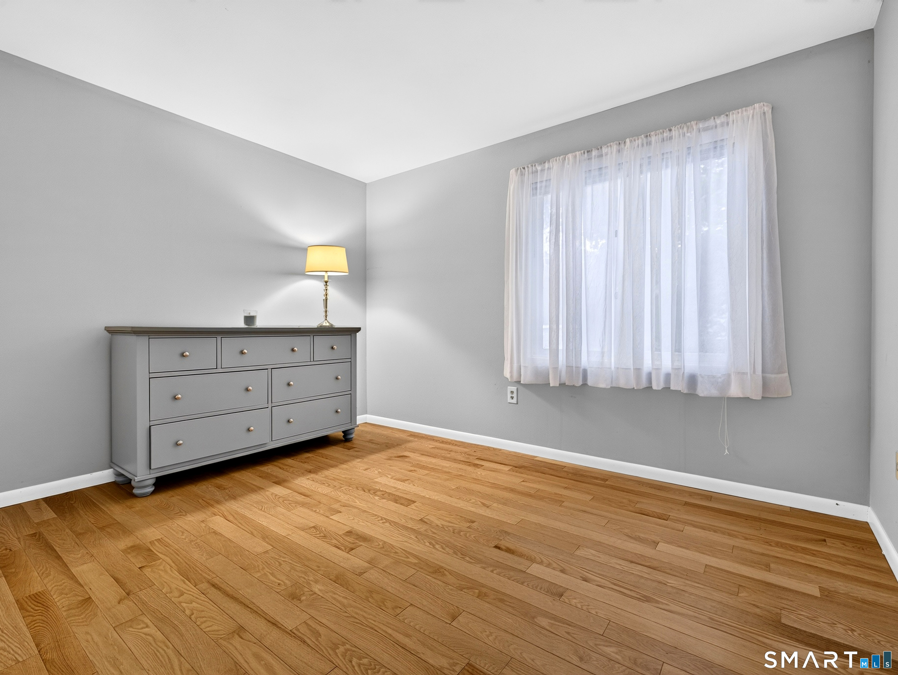 ONE OF THREE BEDROOMS