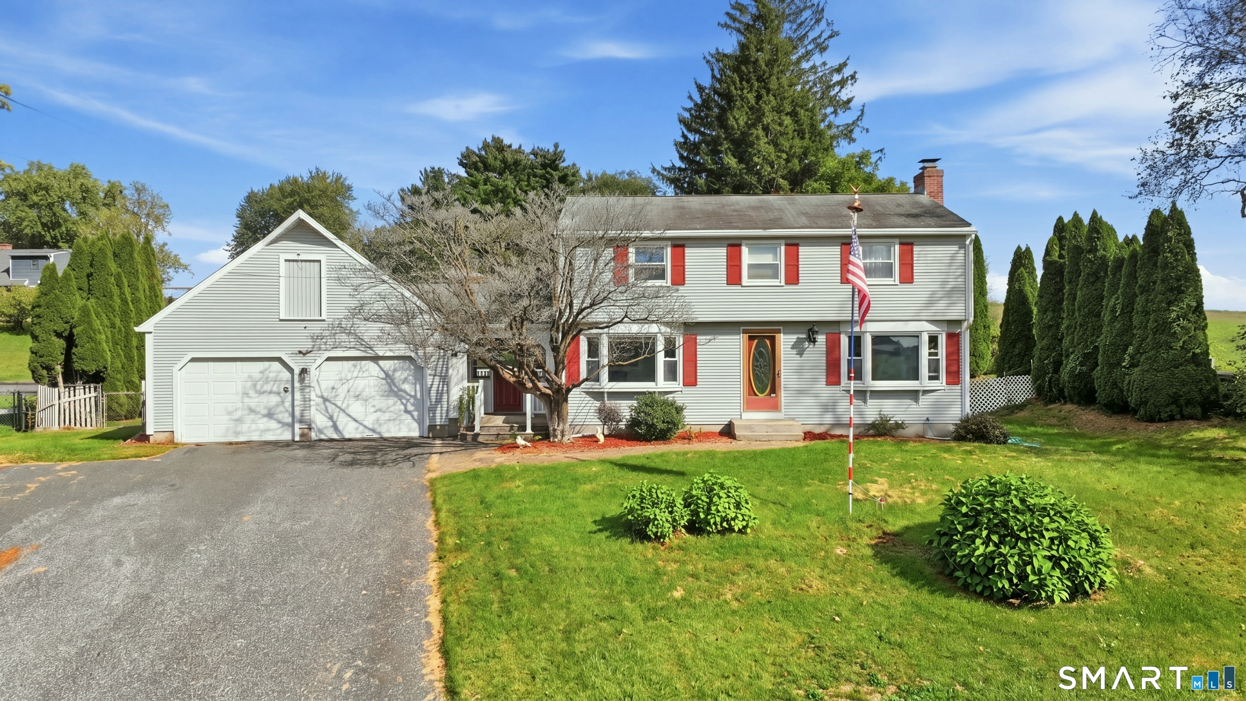 Welcome to this charming 4-bedroom, 1.5 bath Colonial nestled in a peaceful rural setting surrounded by picturesque farmland. This inviting home combines classic character with comfortable living spaces, featuring beautiful hardwood floors throughout, a spacious living room with a cozy fireplace, and a spacious kitchen with an island next to the dining room perfect for gatherings and special occasions. A bright and relaxing sunroom provides the ideal spot to enjoy your morning coffee while taking in the scenic countryside views. With four bedrooms, there is plenty of room for family, guests, a home office, or hobbies. A convenient 2-car garage with a loft adds valuable storage and parking space. Surrounded by open farmland and tranquil views, this Colonial offers the charm of country living while providing a warm and welcoming place to call home.