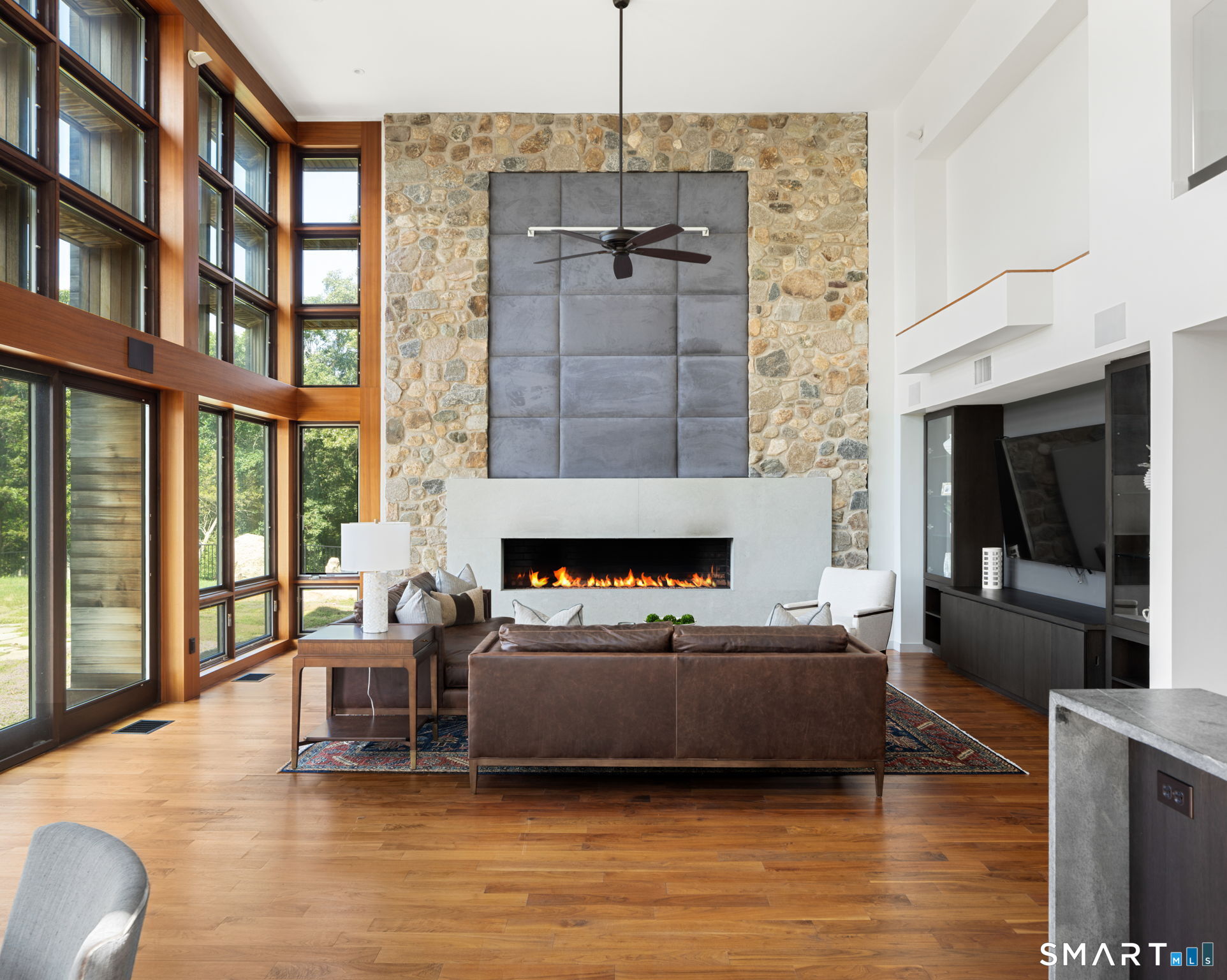 Limestone gas fireplace & built in entertainment center