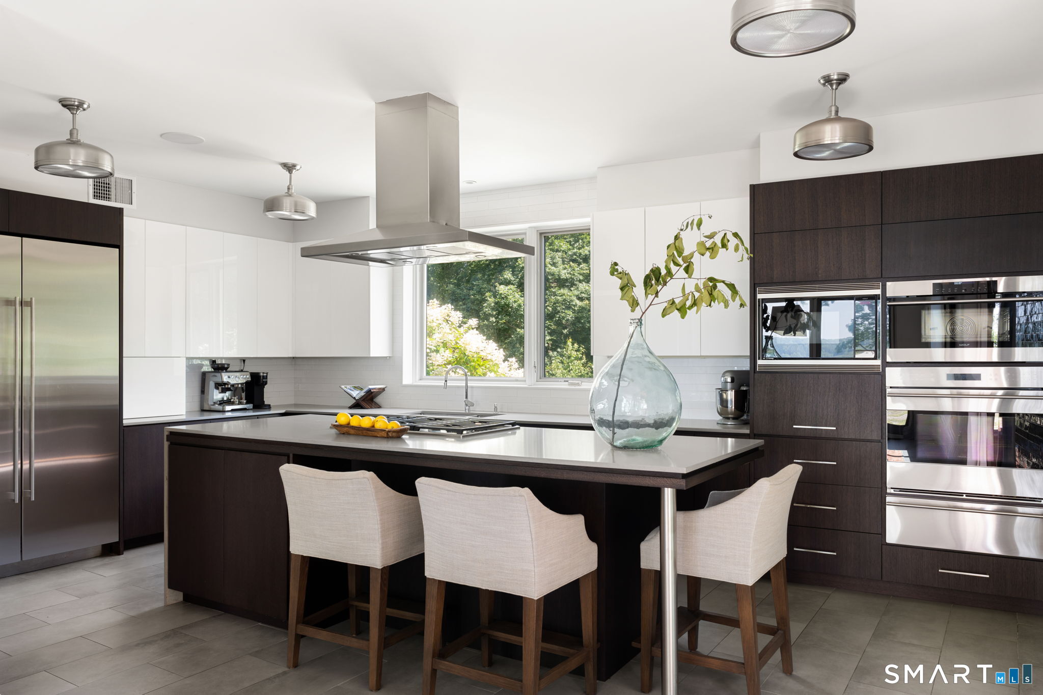 Oversized island for gathering... steam oven, gas cooktop, wolf appliances, sub z fridge