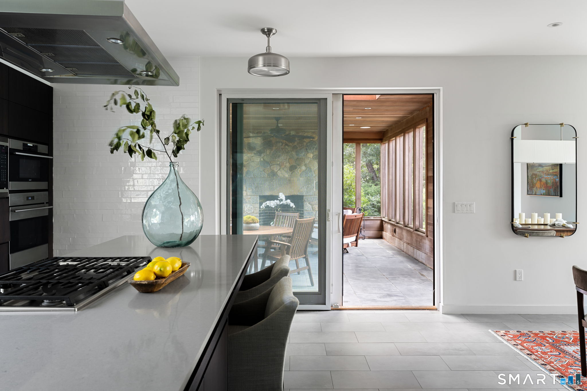 Seamless connection from the kitchen to the screened porch