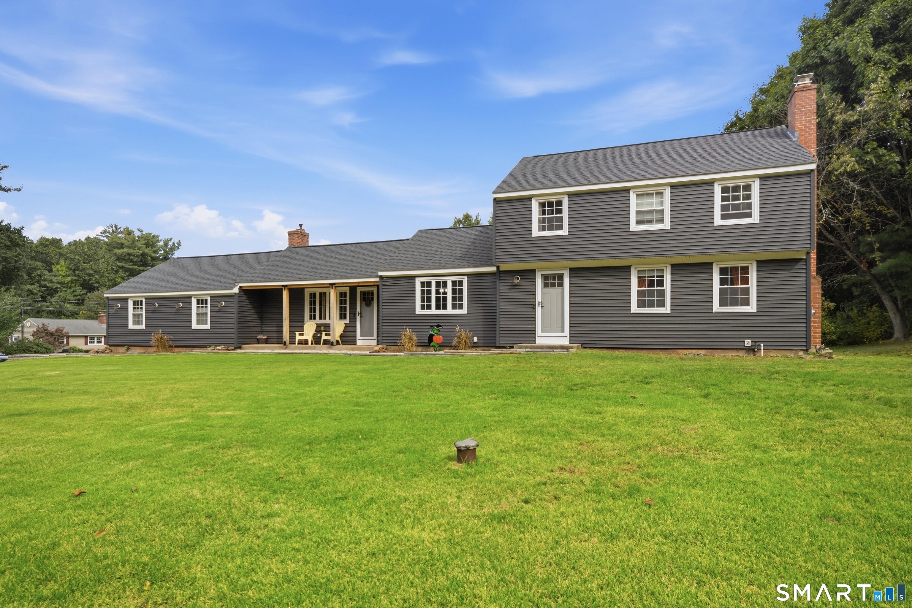 COMING SOON! A true Somers showstopper, this beautifully maintained Colonial blends timeless New England charm with thoughtful updates and exceptional versatility. The impressive family room is the heart of the home, featuring soaring vaulted ceilings, exposed beams, and a dramatic brick fireplace wall that creates a stunning focal point. Filled with natural light, this remarkable space offers an airy, open feel while seamlessly bringing the outdoors in.  The updated eat-in kitchen showcases butcher-block countertops, refreshed cabinetry, and ample space for everyday living and entertaining. A formal dining room is ready for holiday gatherings and celebrations, while an additional living room provides flexibility for a home office, study, or sitting room.  A desirable first-floor bedroom and full bath offer options for guests, multigenerational living, or convenient one-level living. Hardwood floors, central air, a newer roof, and a full basement further enhance the home's appeal.  Outside, enjoy a level corner lot with mature landscaping, a patio, and plenty of room to relax or entertain. The attached garage plus a rare two-story detached garage/workshop provides exceptional space for hobbyists, contractors, entrepreneurs, collectors, or car enthusiasts. Move-in ready and filled with character, warmth, and functionality, this distinctive property offers a rare combination of charm, flexibility, and workshop potential. Stay tuned... this is one you won't want to miss.