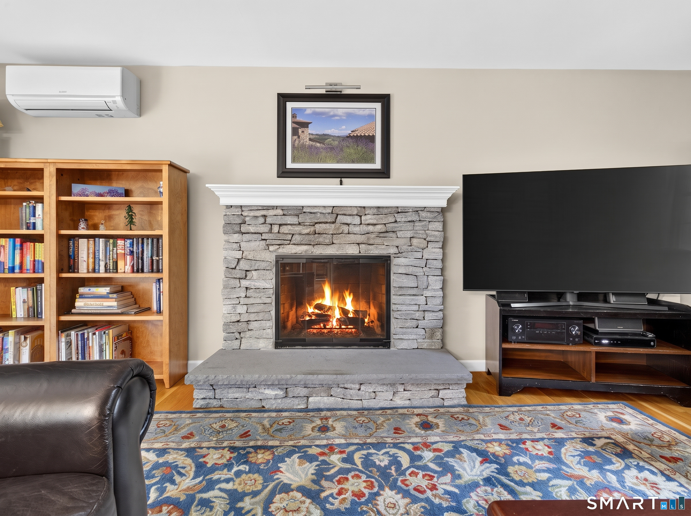 Cozy wood burning fireplace.