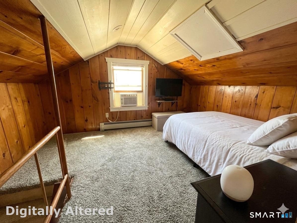 Main house upstairs bedroom with full bath
