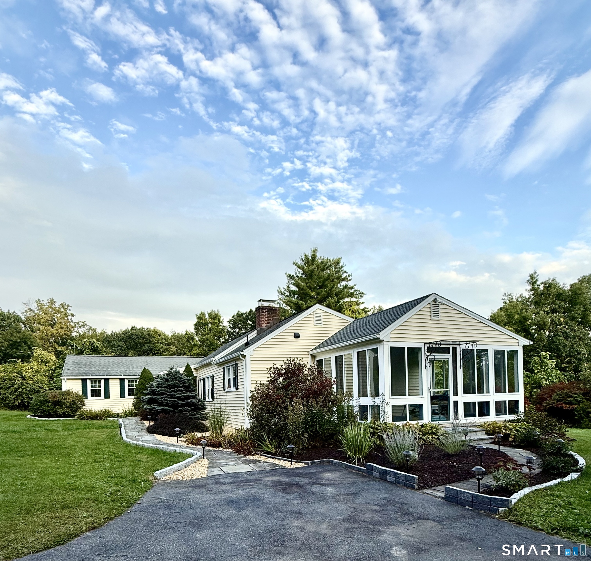 A rare opportunity to own an expansive 8.75-acre horse property in beautiful Bethlehem! This charming ranch offers the perfect blend of comfortable one-level living, modern updates, equestrian amenities, and flexibility for the future. The spacious 3 bedroom home features hardwood floors throughout, a large and inviting living room with a cozy wood stove, a dining room, and a beautifully renovated eat-in kitchen with stainless steel appliances, quartz countertops, and generous workspace. The remodeled full, and a half bath, add to the home's move-in-ready appeal. A large, cozy 3 season sunroom provides an inviting space to relax and enjoy the surrounding property throughout much of the year. The lower level room offers valuable space that can be used as an office, playroom or spare room depending on your needs.   For the equestrian enthusiast, the property includes a large barn and separate stalls, plus the potential to utilize a portion of the barn as a 2 car garage, complete with a separate driveway. The main driveway provides ample parking. The property also features fully paid solar panels, providing an energy-efficient benefit. A brand-new septic system will be installed at the end of October.      With major acreage, the property provides privacy, room for horses & outdoor activities. Potential subdivision may exist,- buyer to conduct their own independent due diligence with the Town of Bethlehem.   Come experience all that 217 Munger Lane has to offer!!
