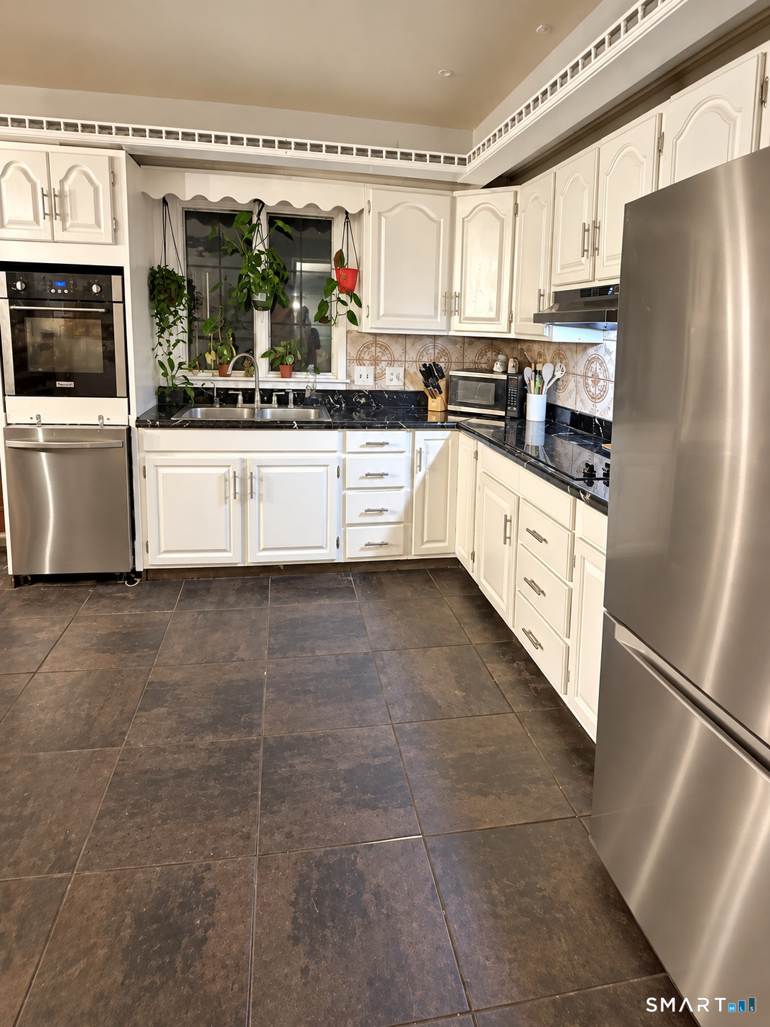 Photo 4 of Single family home for sale at 23 Coach Cir, Windsor, CT 06095 | MLS# 24210142 | Listing updated on 2026-10-07